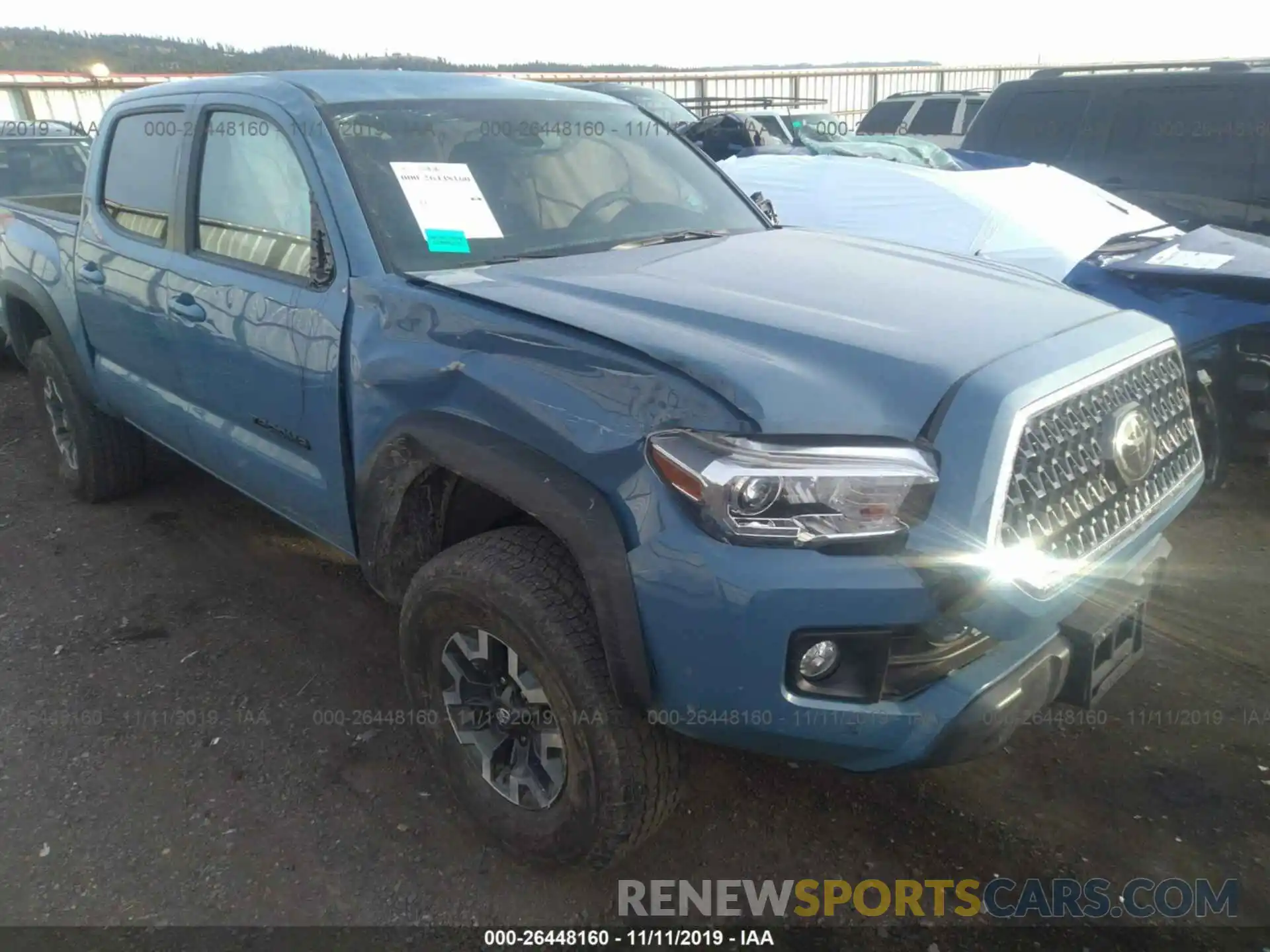 6 Photograph of a damaged car 3TMCZ5AN7KM224957 TOYOTA TACOMA 2019