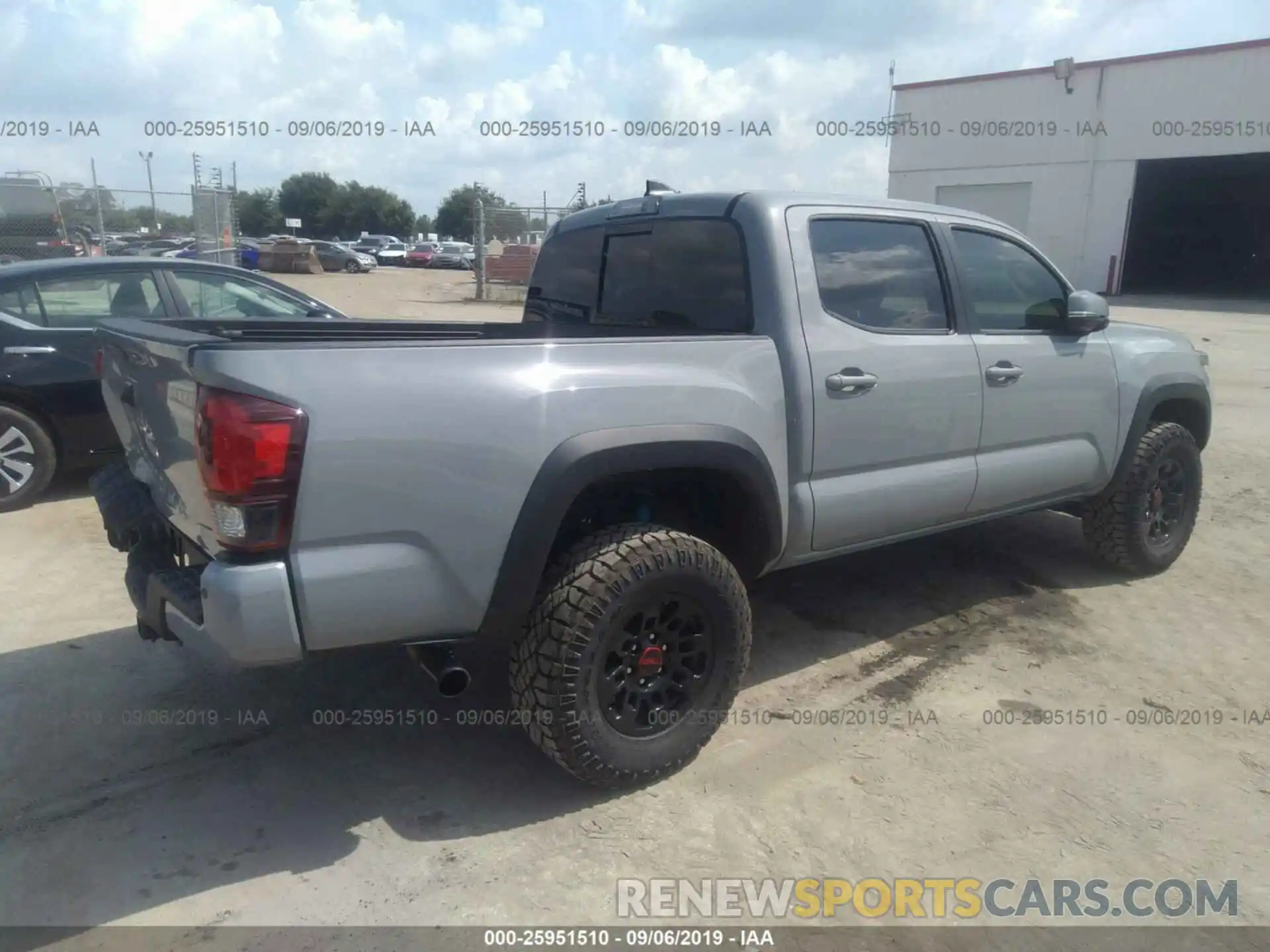 4 Photograph of a damaged car 3TMCZ5AN7KM231519 TOYOTA TACOMA 2019