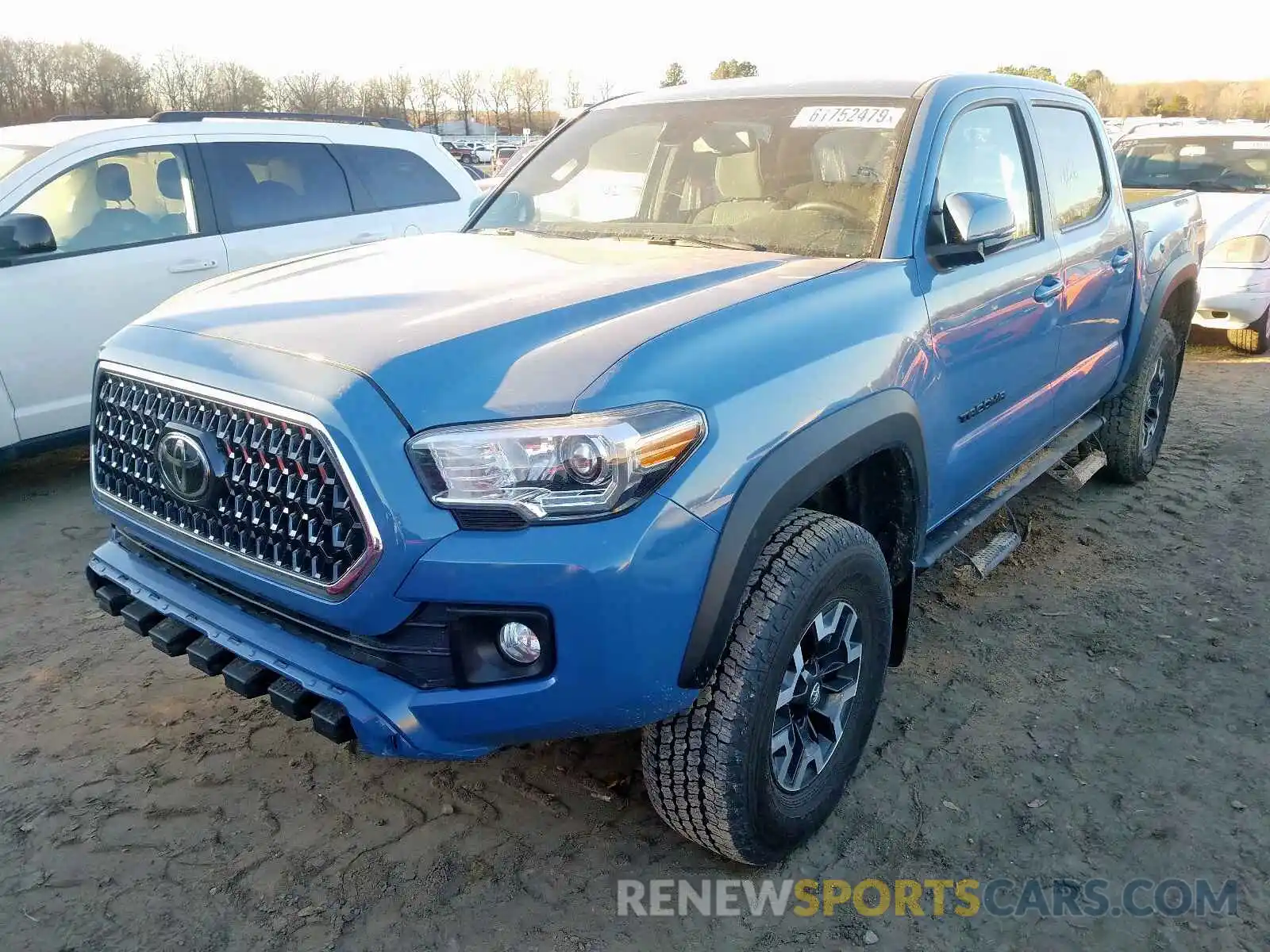 2 Photograph of a damaged car 3TMCZ5AN7KM238535 TOYOTA TACOMA 2019