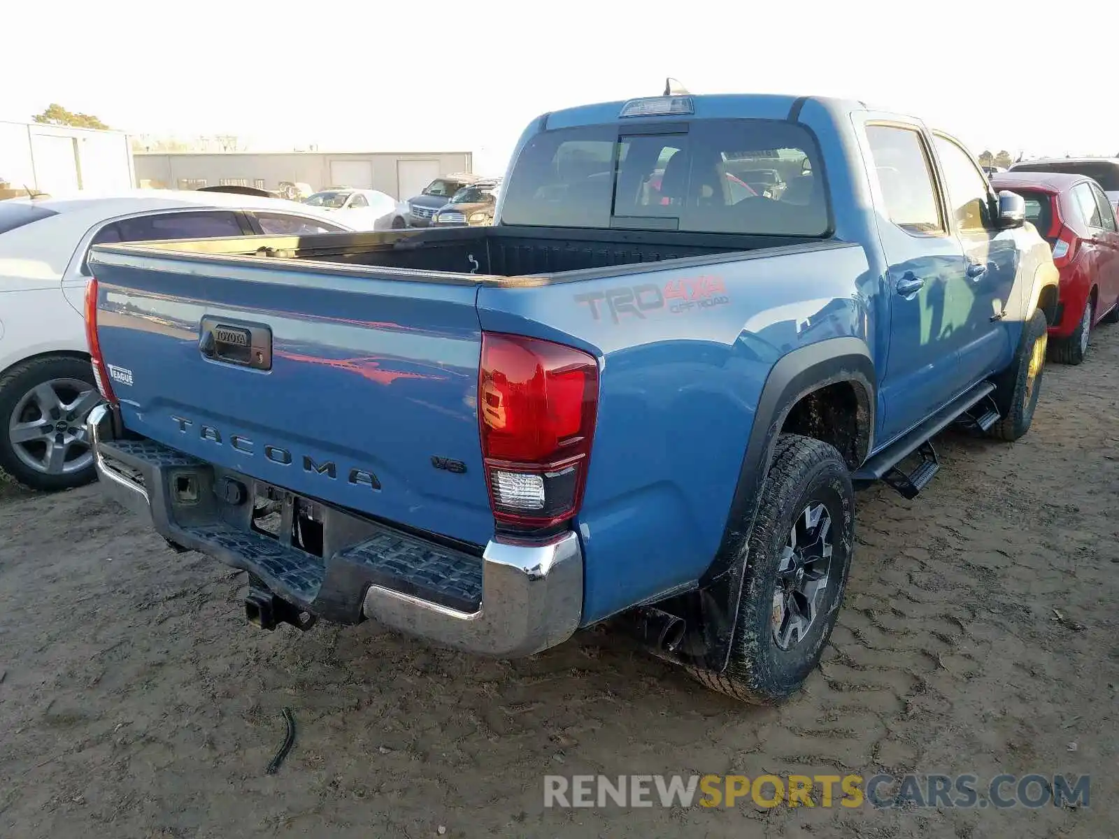 4 Photograph of a damaged car 3TMCZ5AN7KM238535 TOYOTA TACOMA 2019