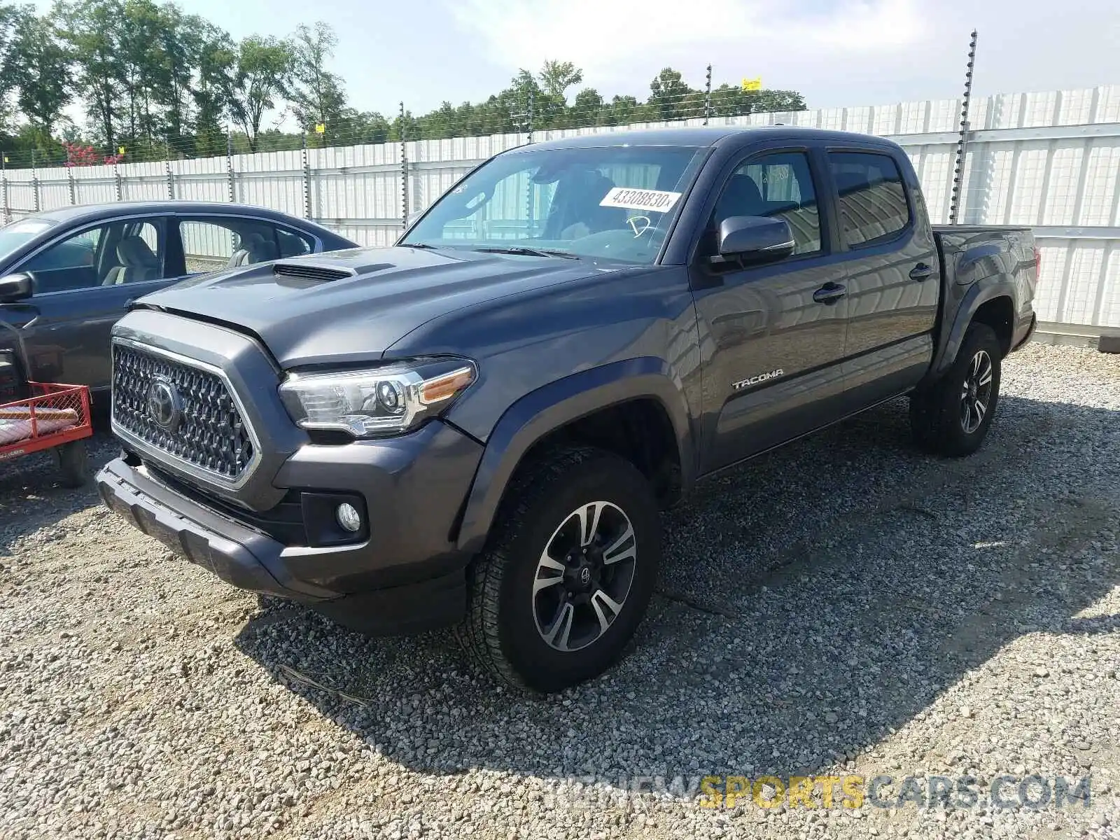 2 Photograph of a damaged car 3TMCZ5AN7KM238745 TOYOTA TACOMA 2019