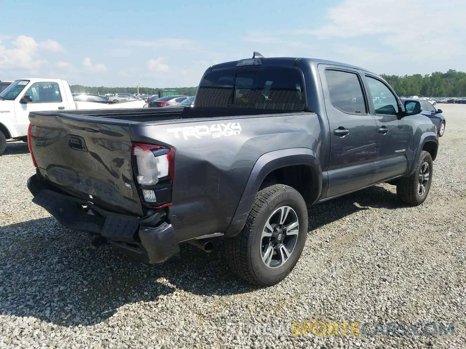 4 Photograph of a damaged car 3TMCZ5AN7KM238745 TOYOTA TACOMA 2019