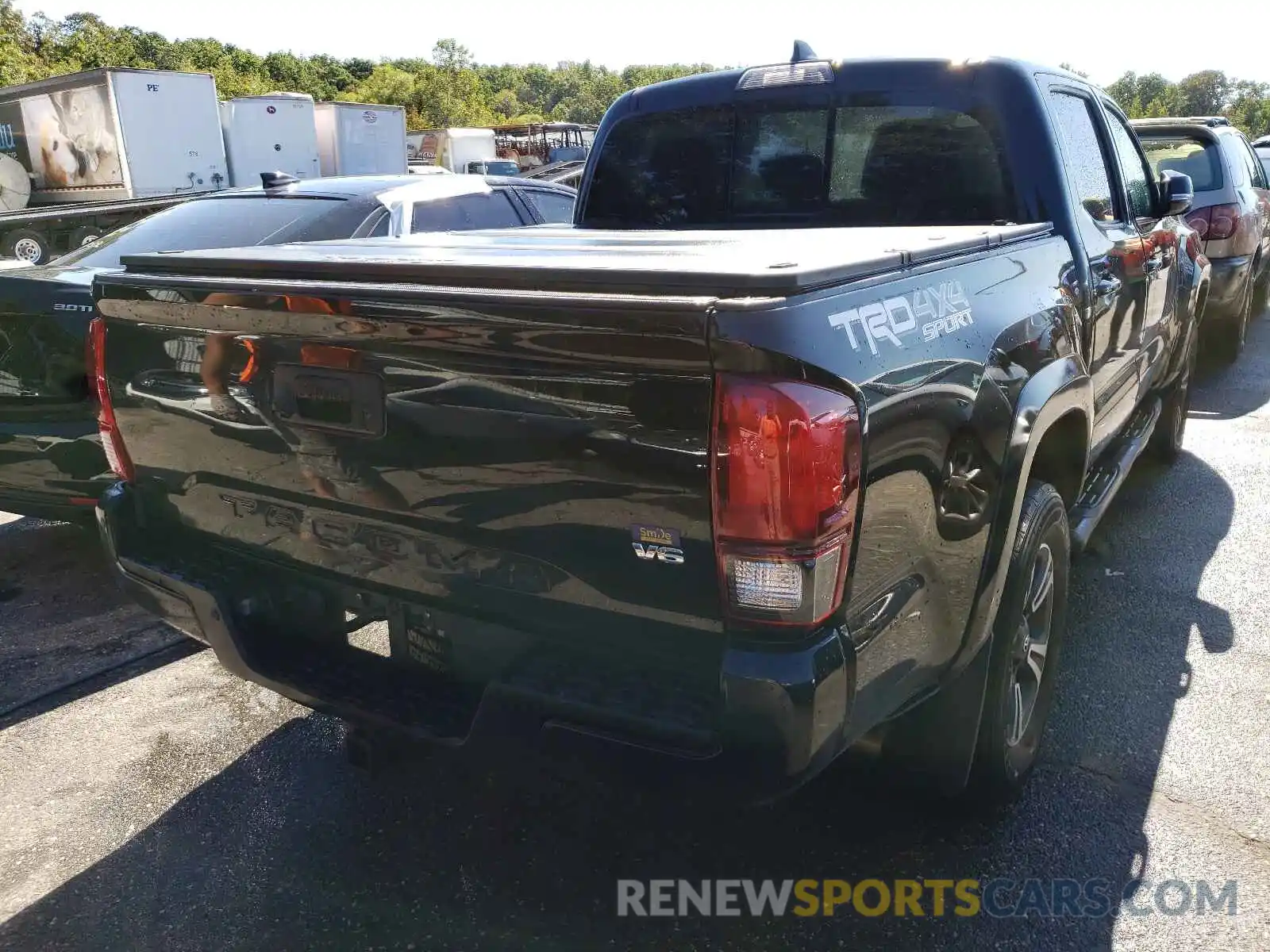 4 Photograph of a damaged car 3TMCZ5AN7KM239412 TOYOTA TACOMA 2019