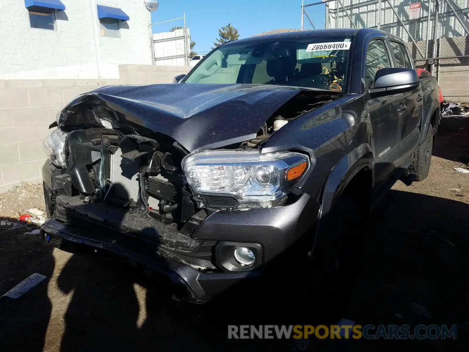 2 Photograph of a damaged car 3TMCZ5AN7KM241144 TOYOTA TACOMA 2019