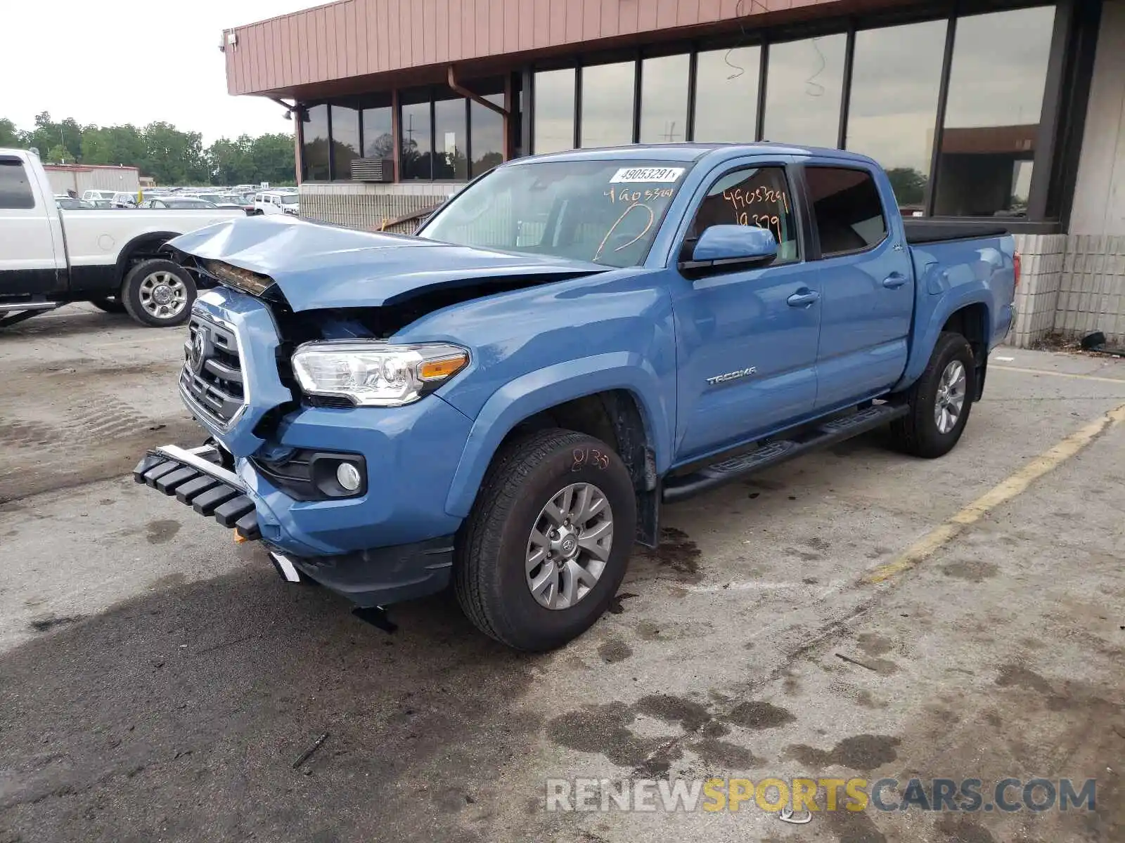 2 Photograph of a damaged car 3TMCZ5AN7KM241838 TOYOTA TACOMA 2019