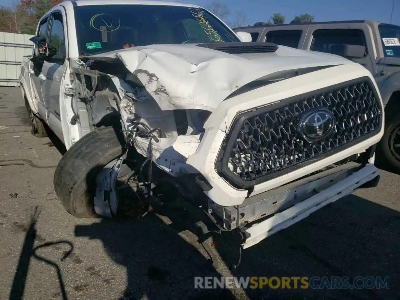 9 Photograph of a damaged car 3TMCZ5AN7KM242455 TOYOTA TACOMA 2019