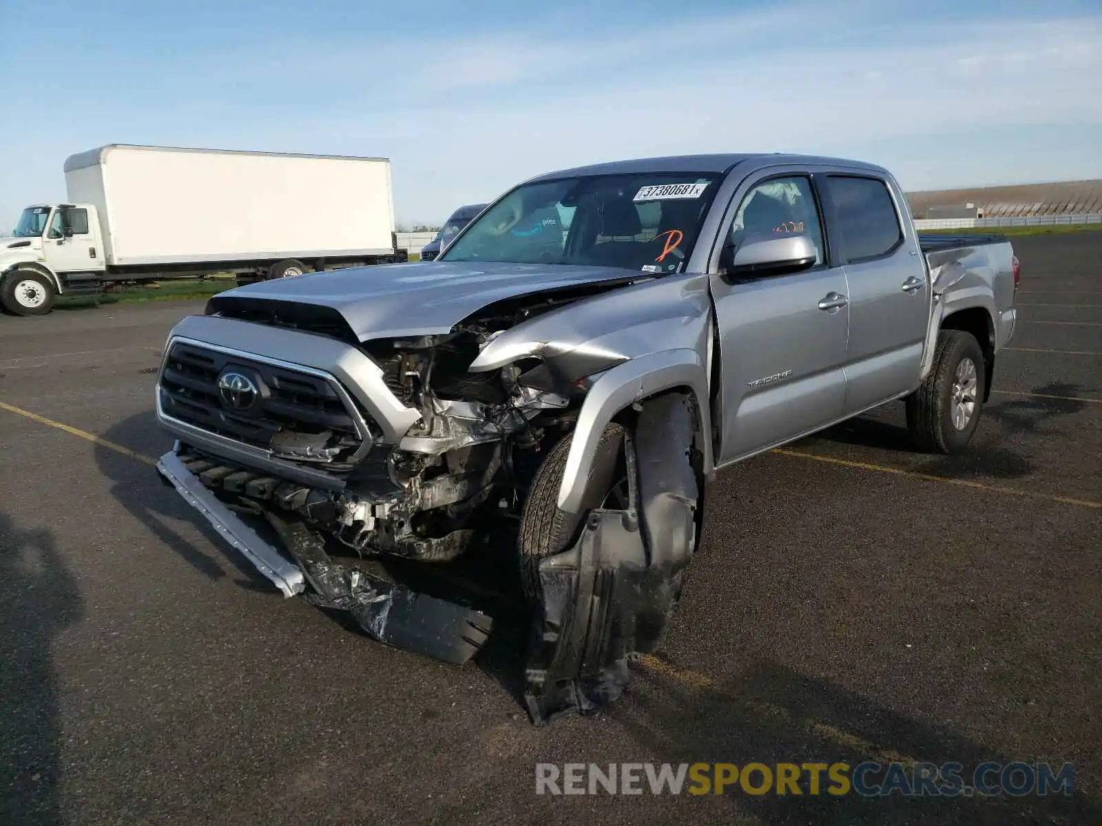 2 Photograph of a damaged car 3TMCZ5AN7KM246120 TOYOTA TACOMA 2019