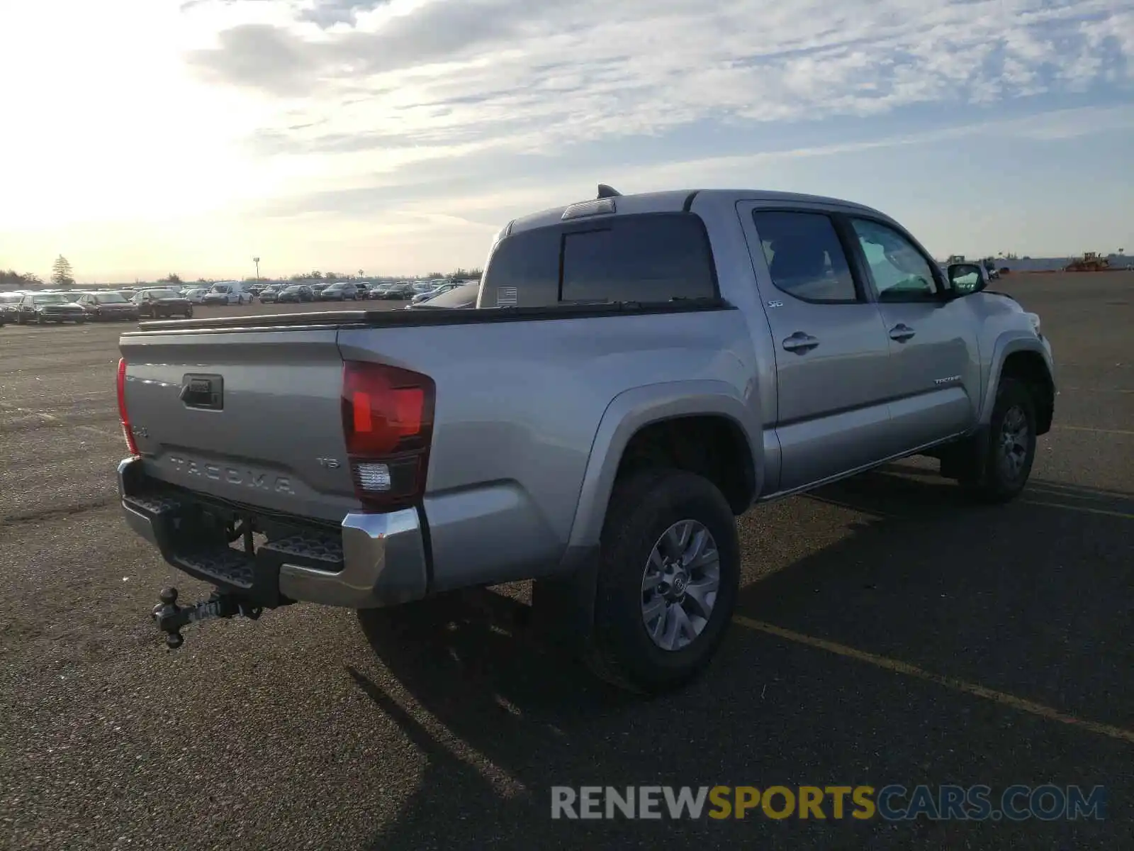 4 Photograph of a damaged car 3TMCZ5AN7KM246120 TOYOTA TACOMA 2019