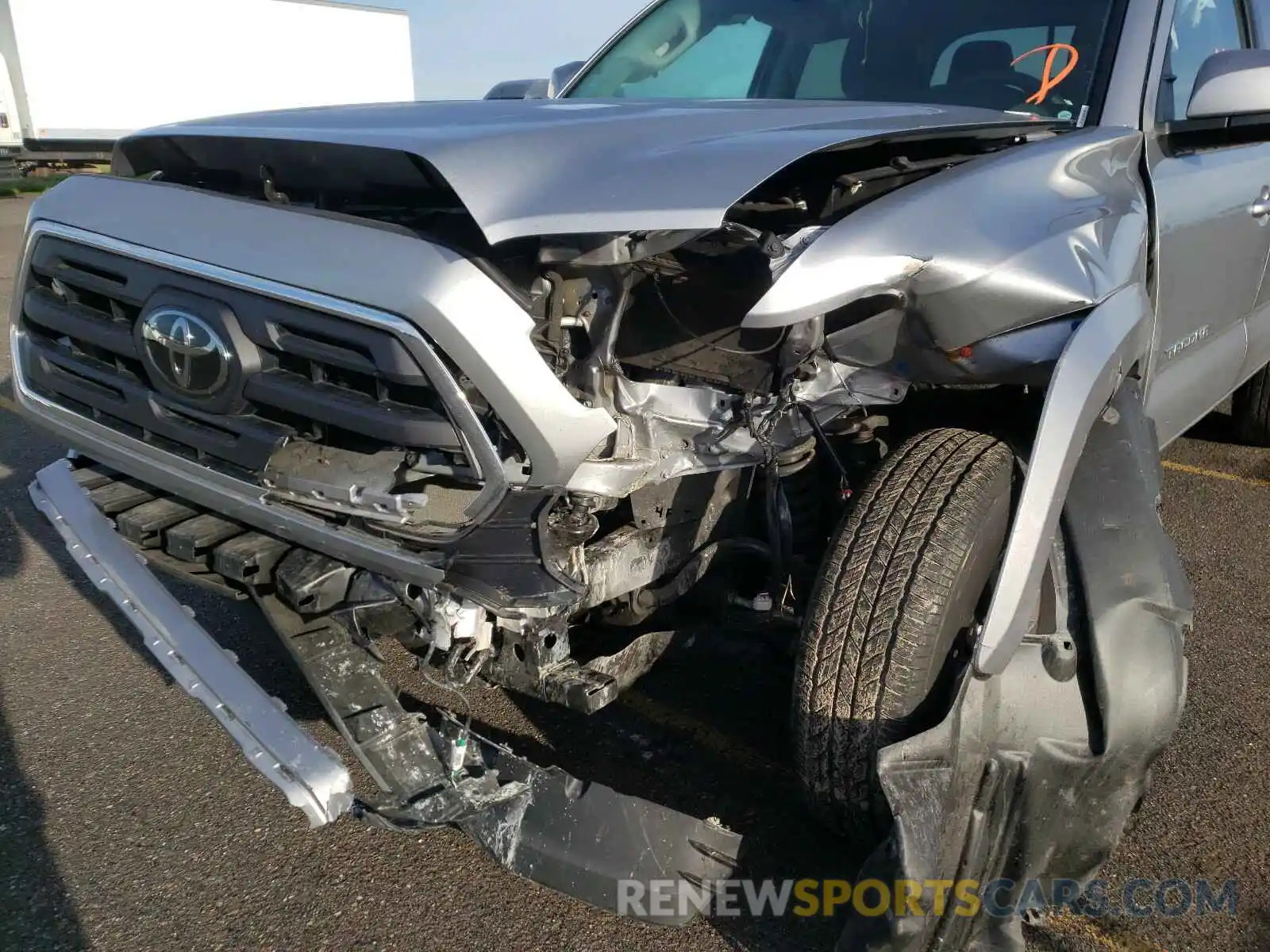 9 Photograph of a damaged car 3TMCZ5AN7KM246120 TOYOTA TACOMA 2019