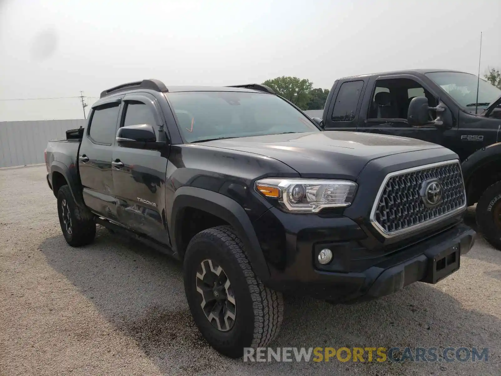 1 Photograph of a damaged car 3TMCZ5AN7KM247512 TOYOTA TACOMA 2019