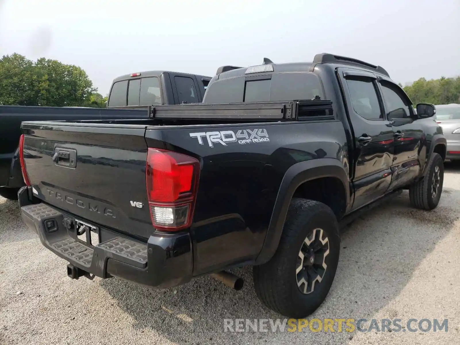 4 Photograph of a damaged car 3TMCZ5AN7KM247512 TOYOTA TACOMA 2019