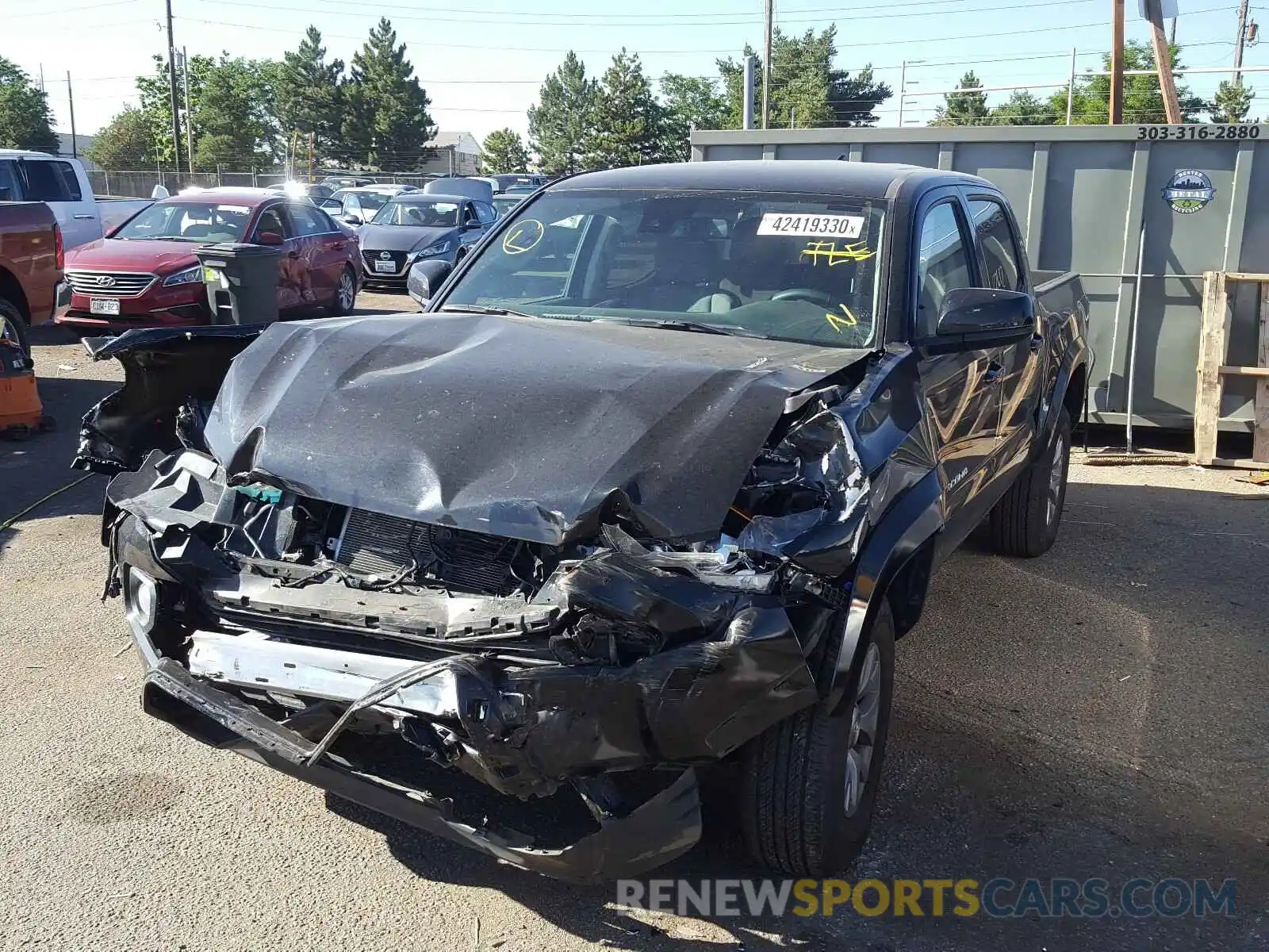 2 Photograph of a damaged car 3TMCZ5AN7KM248644 TOYOTA TACOMA 2019