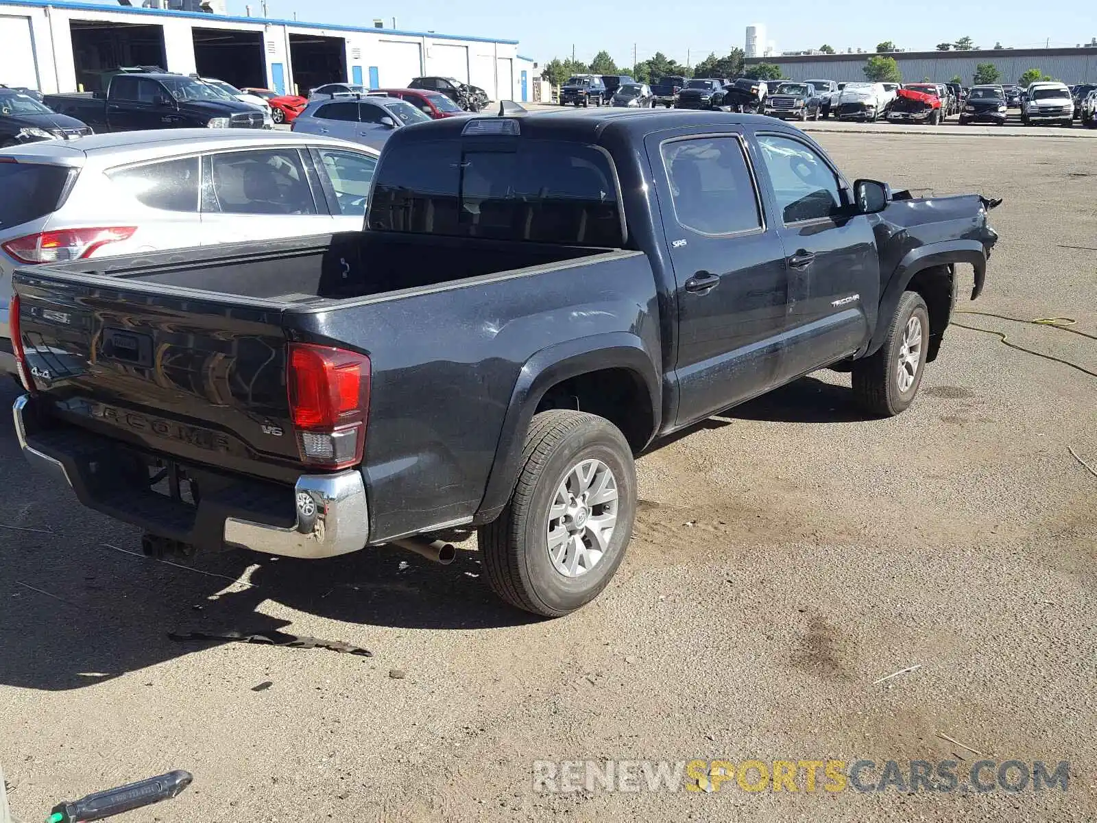 4 Photograph of a damaged car 3TMCZ5AN7KM248644 TOYOTA TACOMA 2019