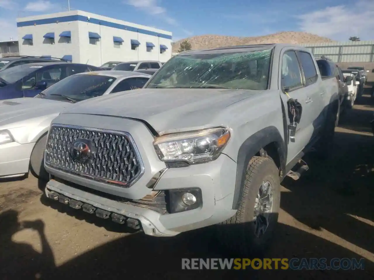 2 Photograph of a damaged car 3TMCZ5AN7KM250457 TOYOTA TACOMA 2019