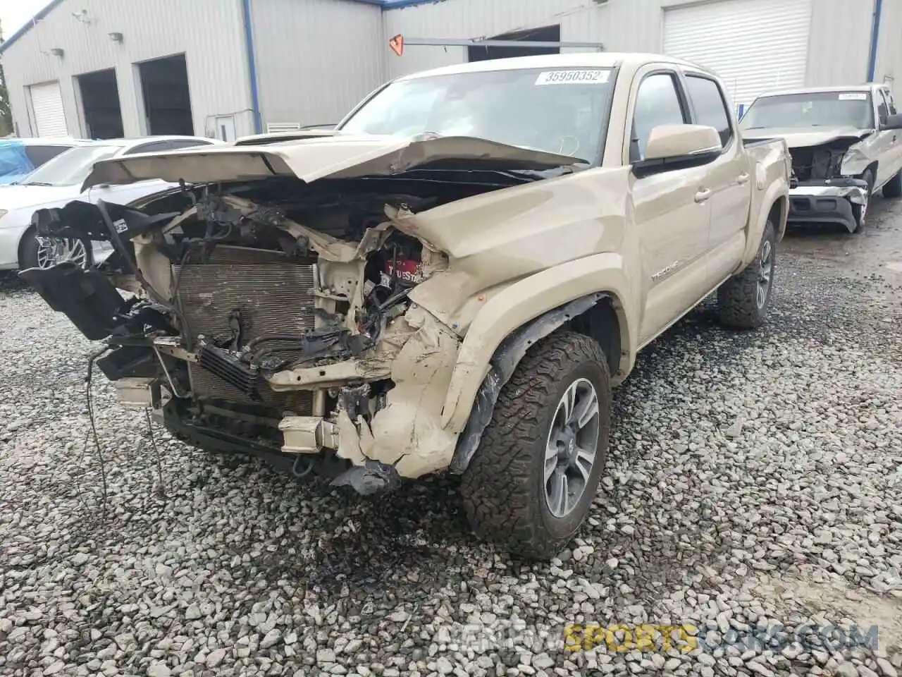 2 Photograph of a damaged car 3TMCZ5AN7KM252631 TOYOTA TACOMA 2019