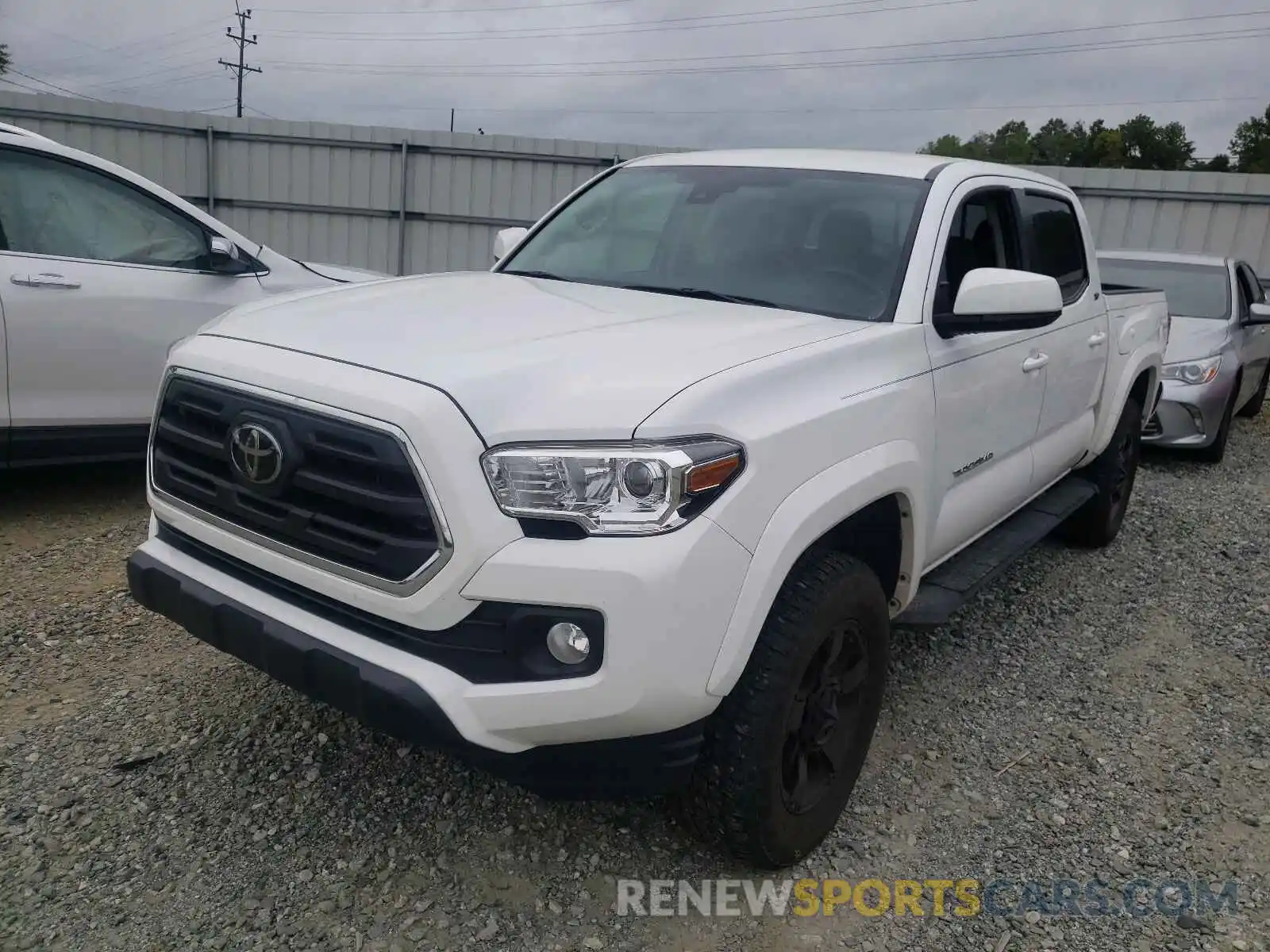 2 Photograph of a damaged car 3TMCZ5AN7KM253388 TOYOTA TACOMA 2019