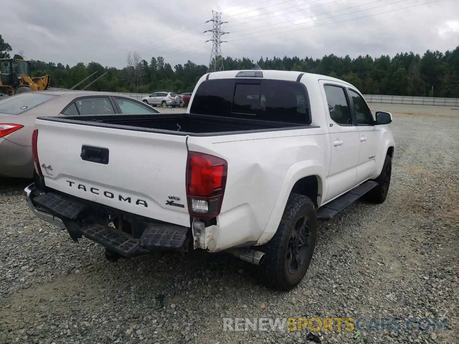 4 Photograph of a damaged car 3TMCZ5AN7KM253388 TOYOTA TACOMA 2019