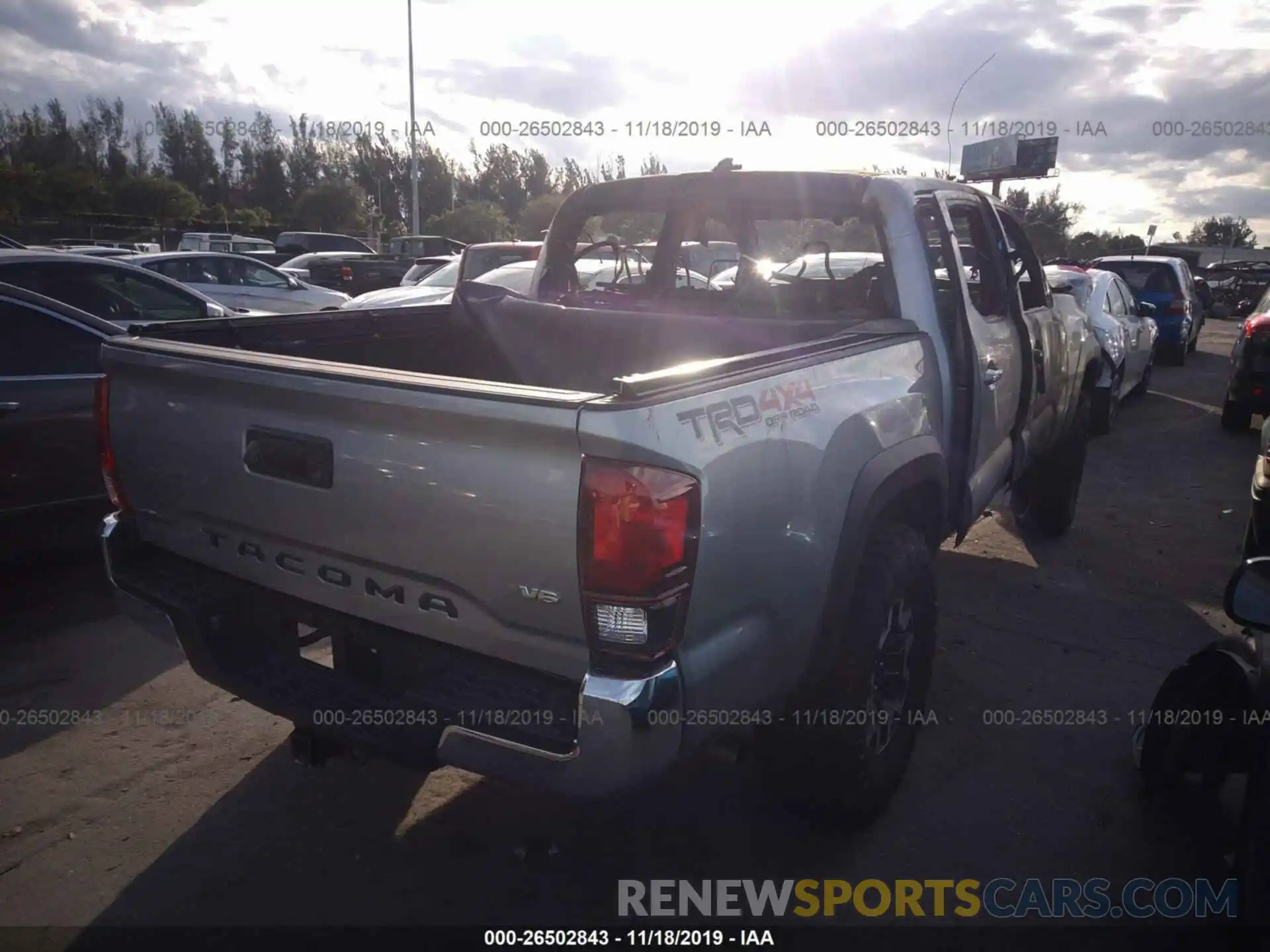 4 Photograph of a damaged car 3TMCZ5AN7KM253536 TOYOTA TACOMA 2019