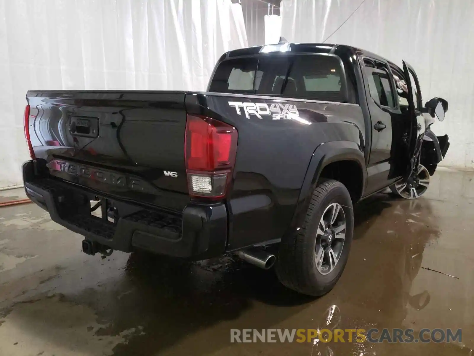 4 Photograph of a damaged car 3TMCZ5AN7KM255349 TOYOTA TACOMA 2019