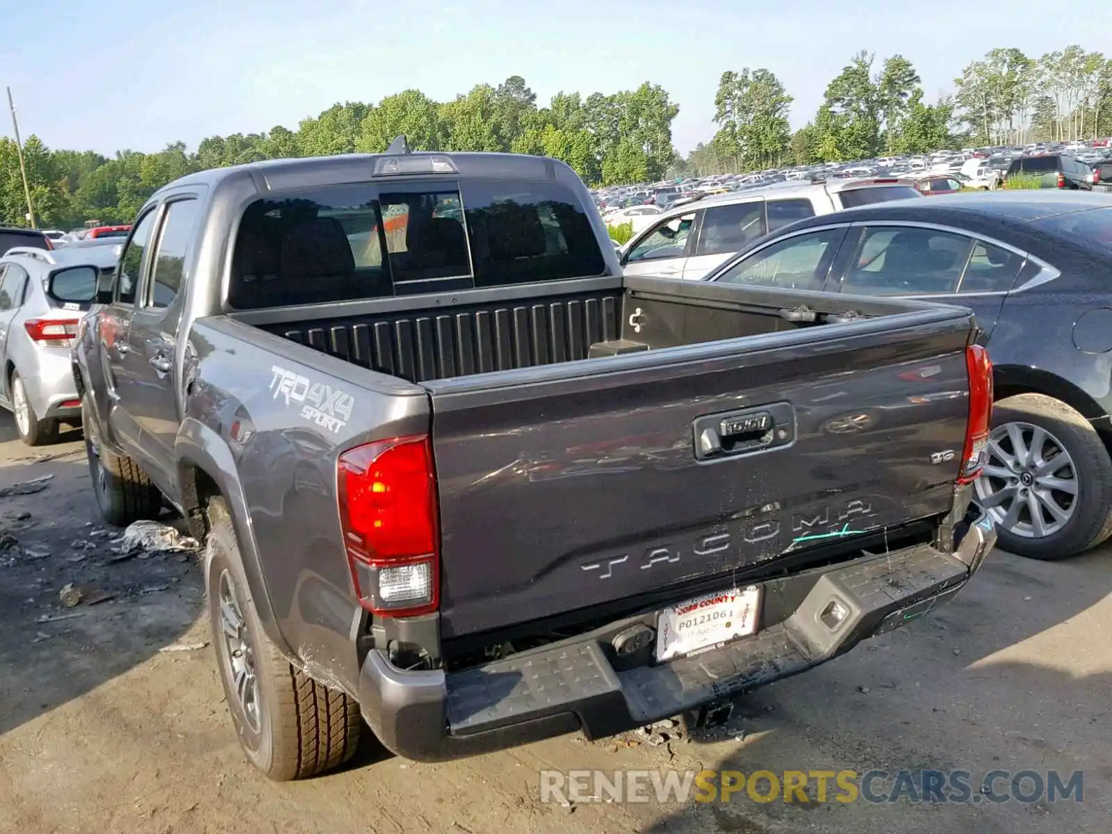 3 Photograph of a damaged car 3TMCZ5AN7KM257358 TOYOTA TACOMA 2019