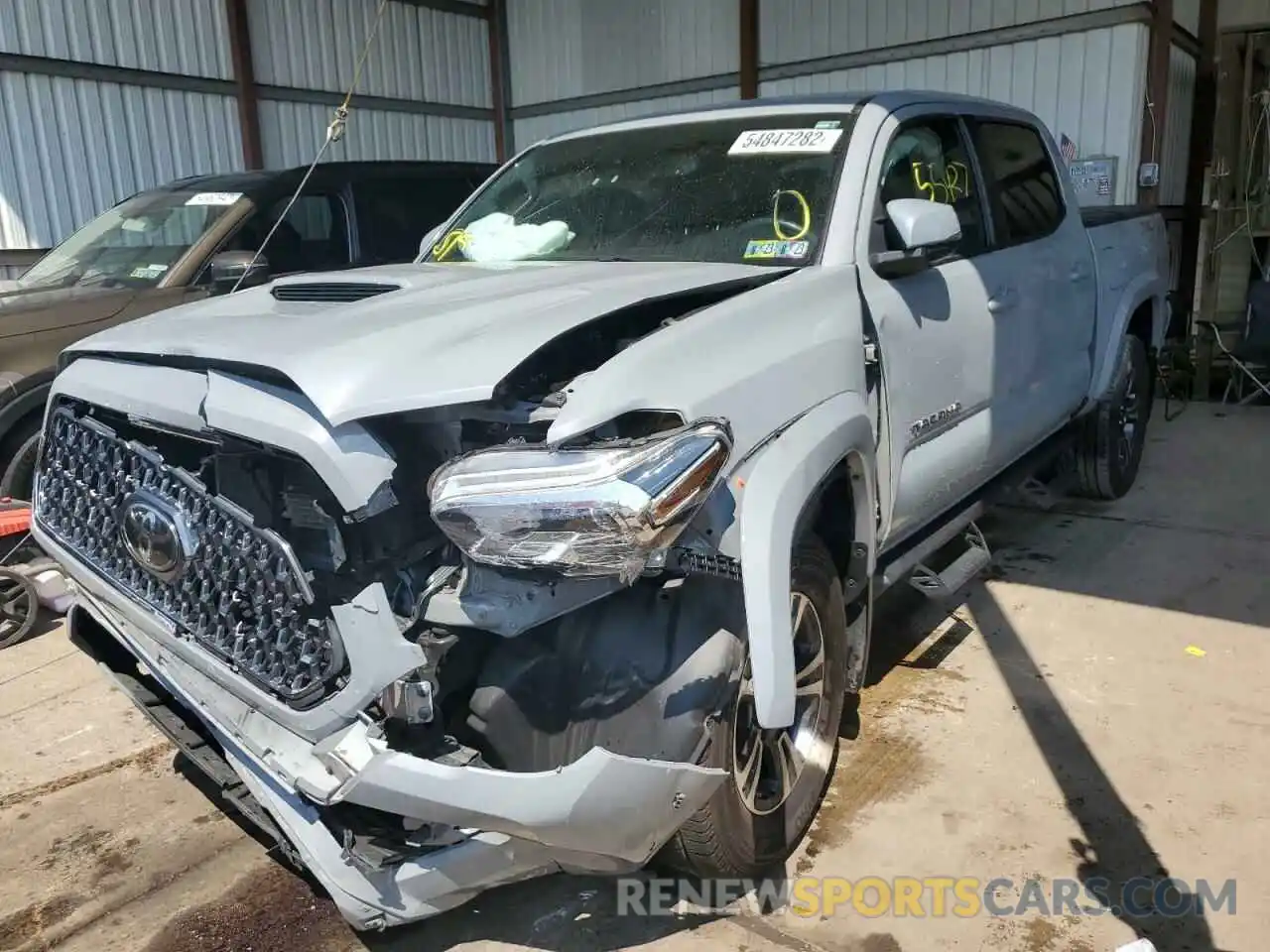 2 Photograph of a damaged car 3TMCZ5AN7KM257392 TOYOTA TACOMA 2019