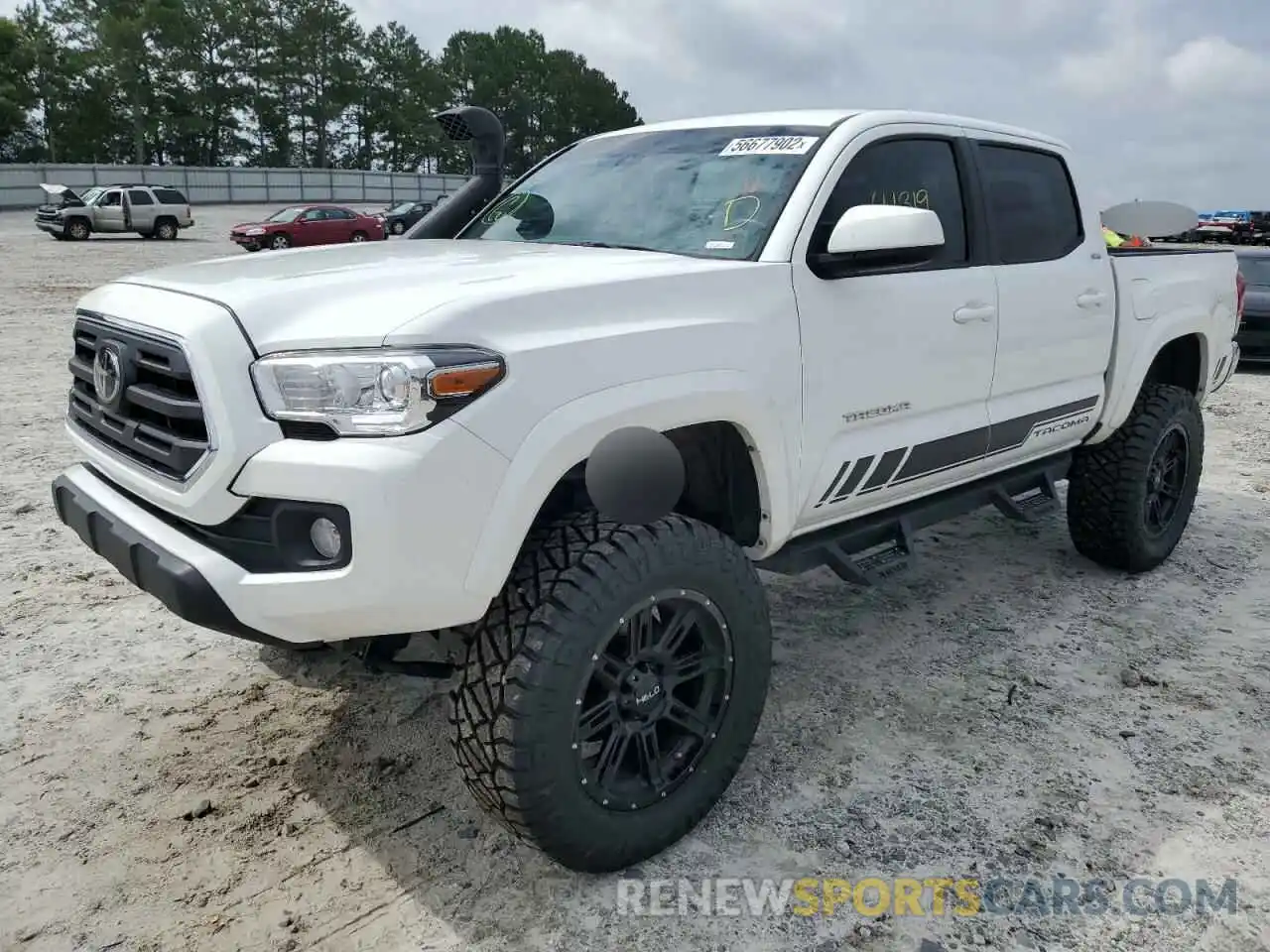 2 Photograph of a damaged car 3TMCZ5AN7KM261135 TOYOTA TACOMA 2019