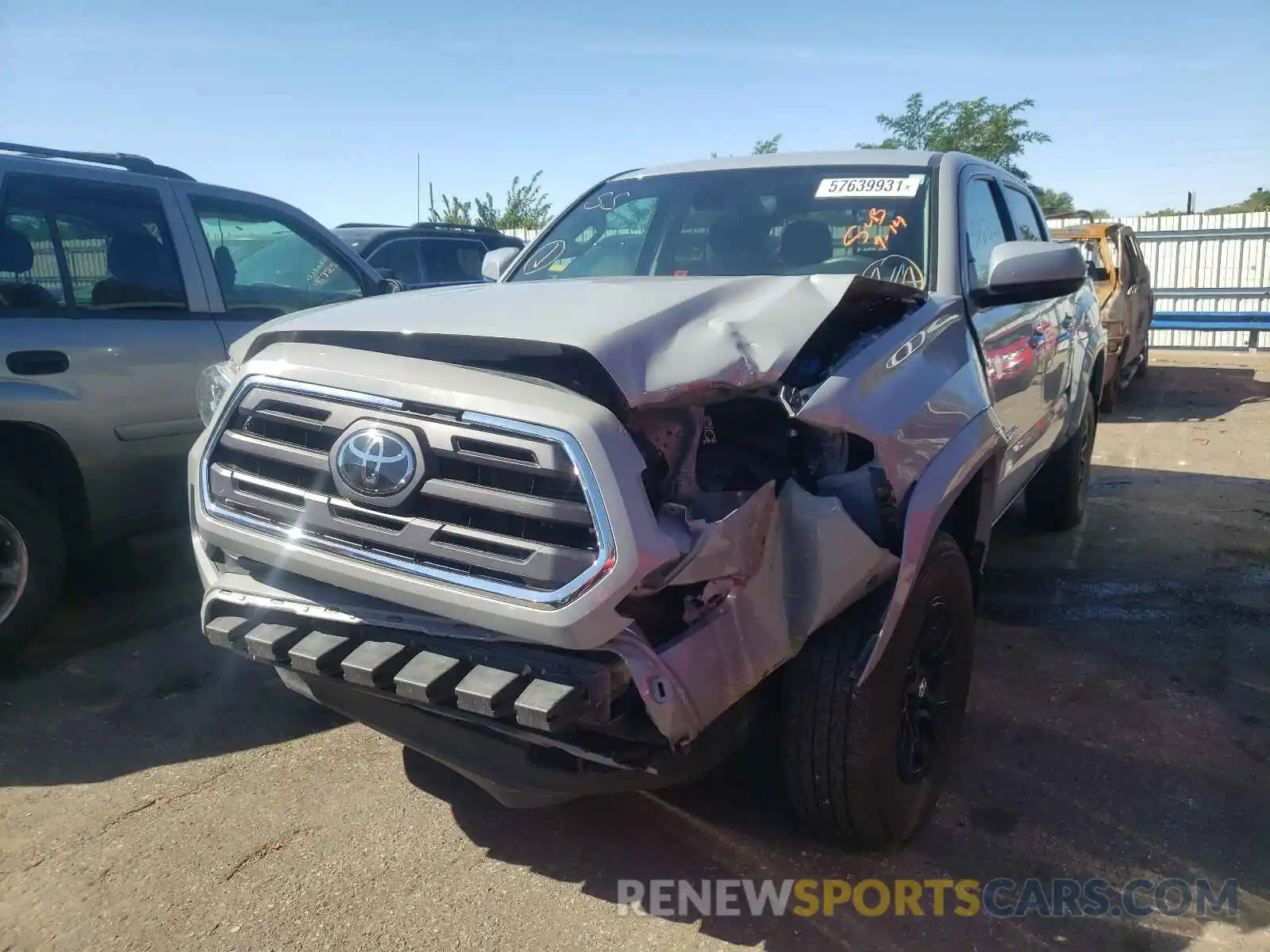 9 Photograph of a damaged car 3TMCZ5AN7KM263323 TOYOTA TACOMA 2019