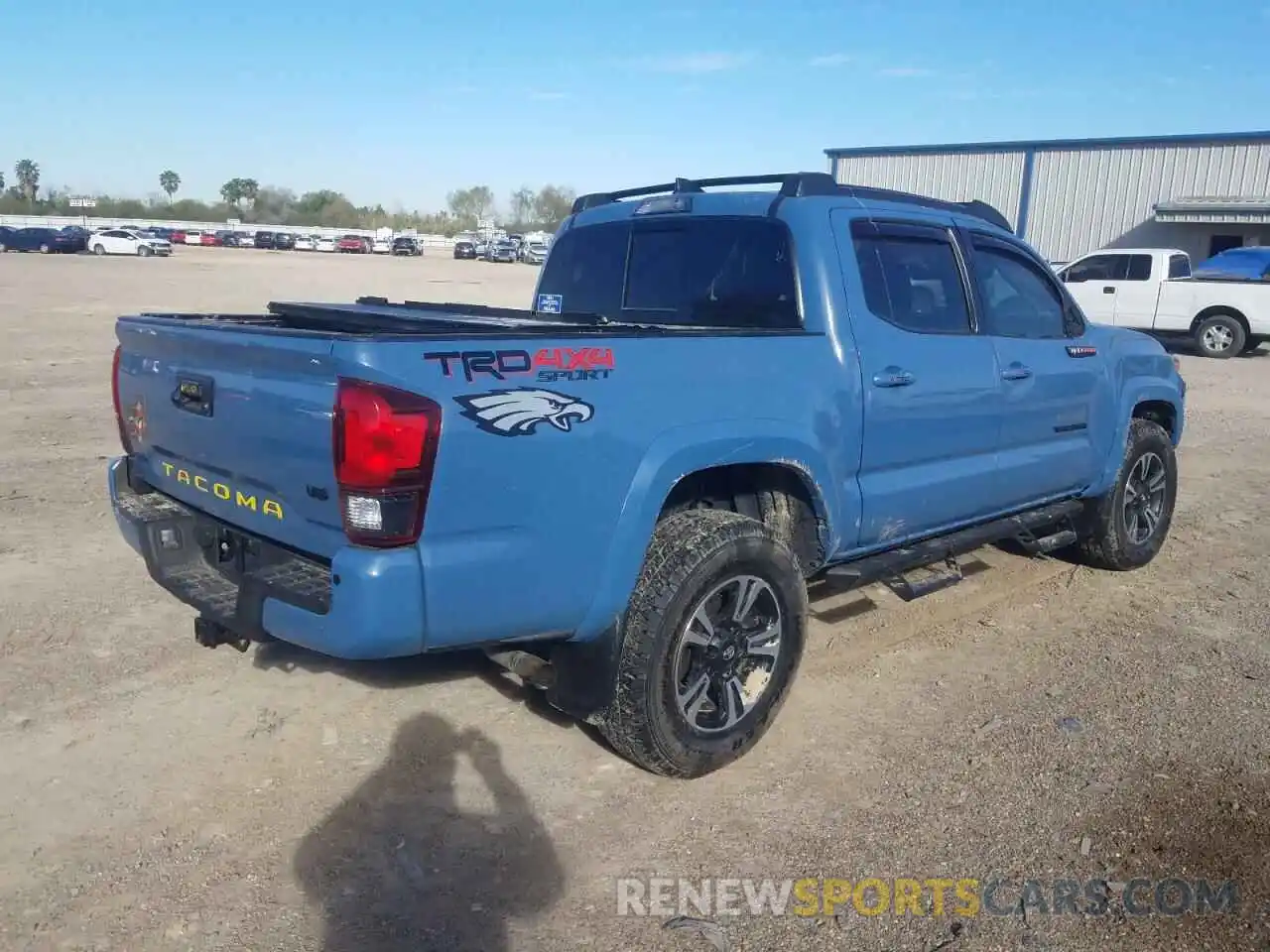 4 Photograph of a damaged car 3TMCZ5AN7KM263984 TOYOTA TACOMA 2019