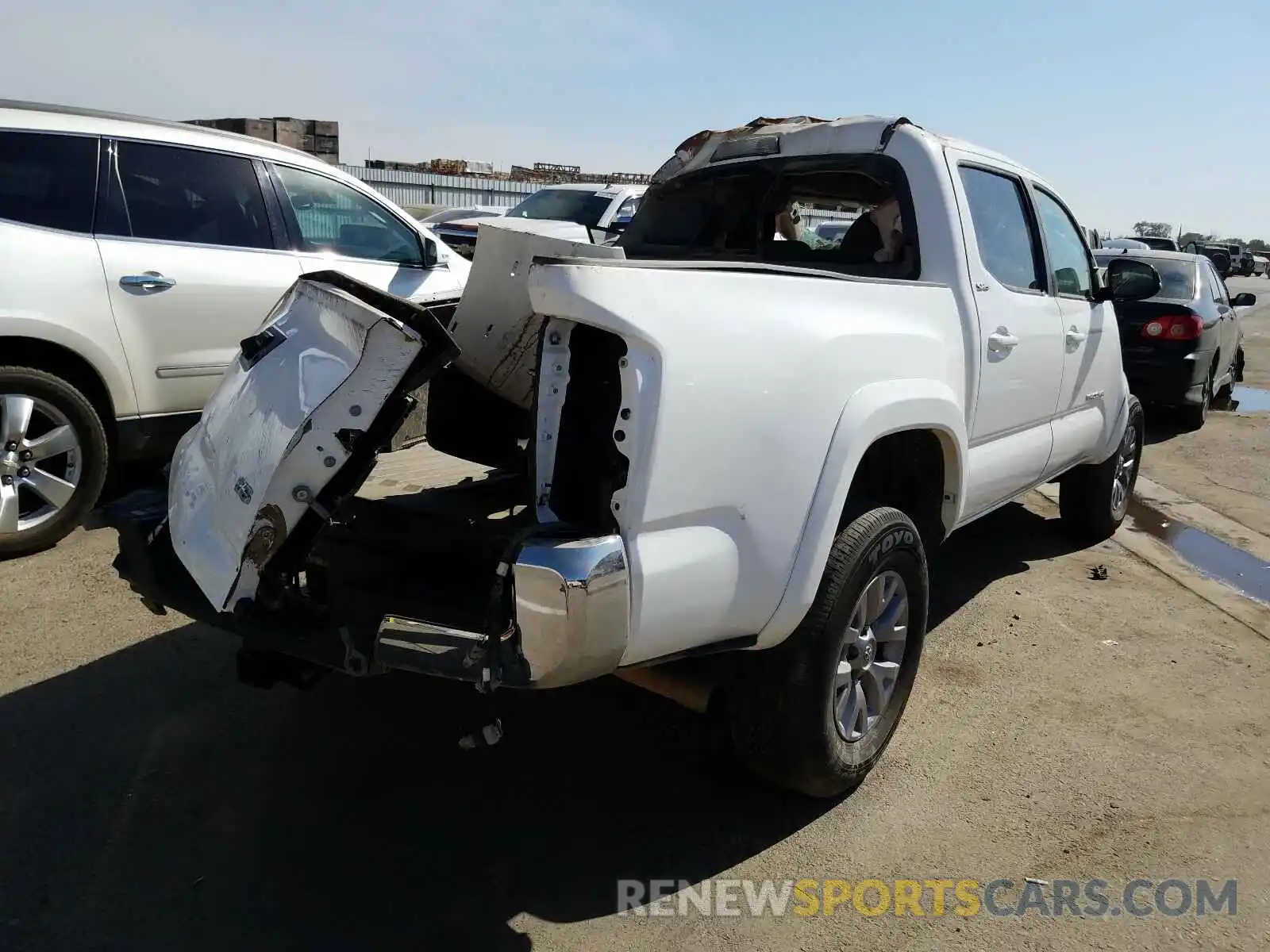 4 Photograph of a damaged car 3TMCZ5AN7KM274502 TOYOTA TACOMA 2019