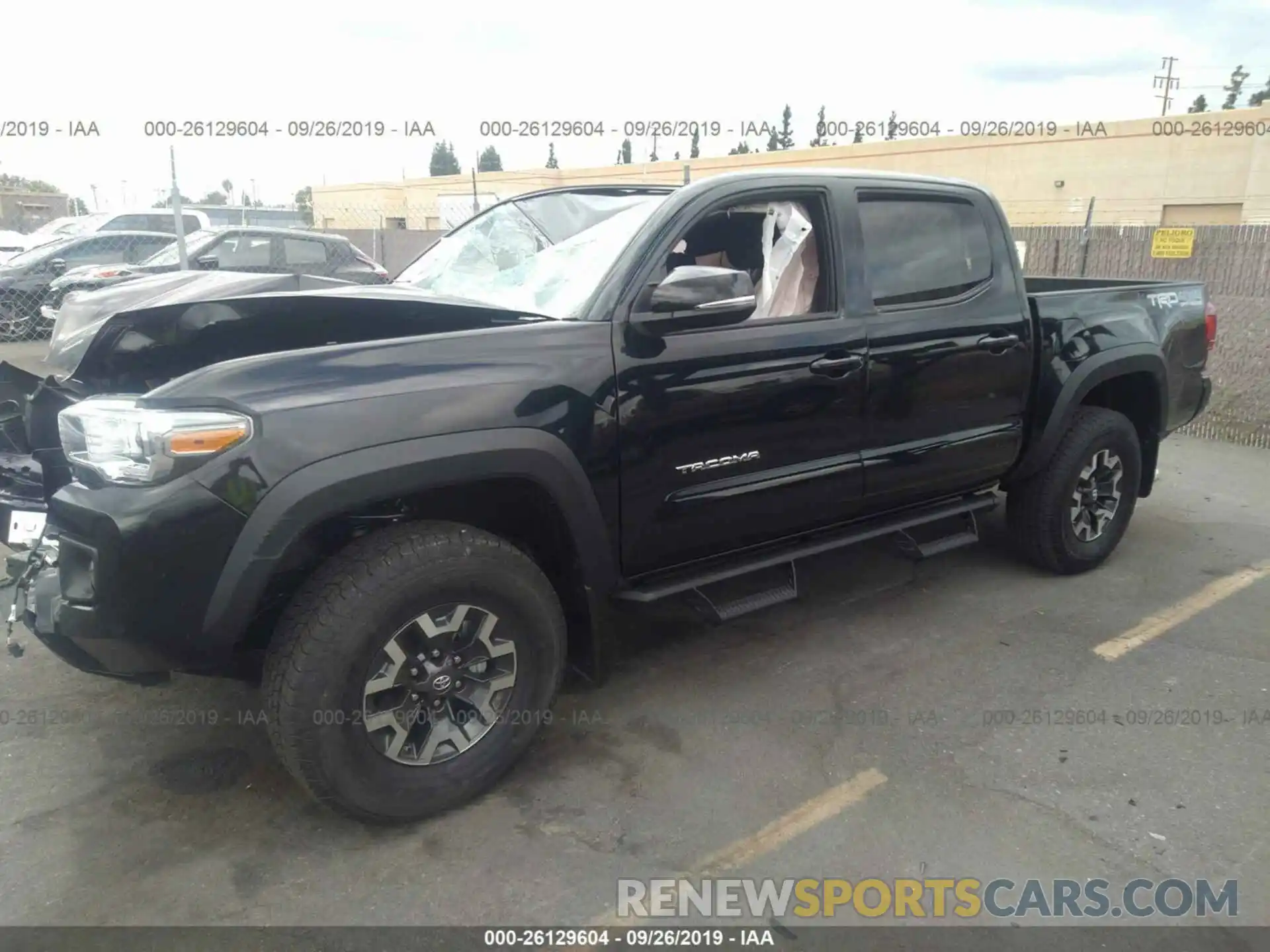 2 Photograph of a damaged car 3TMCZ5AN7KM274869 TOYOTA TACOMA 2019