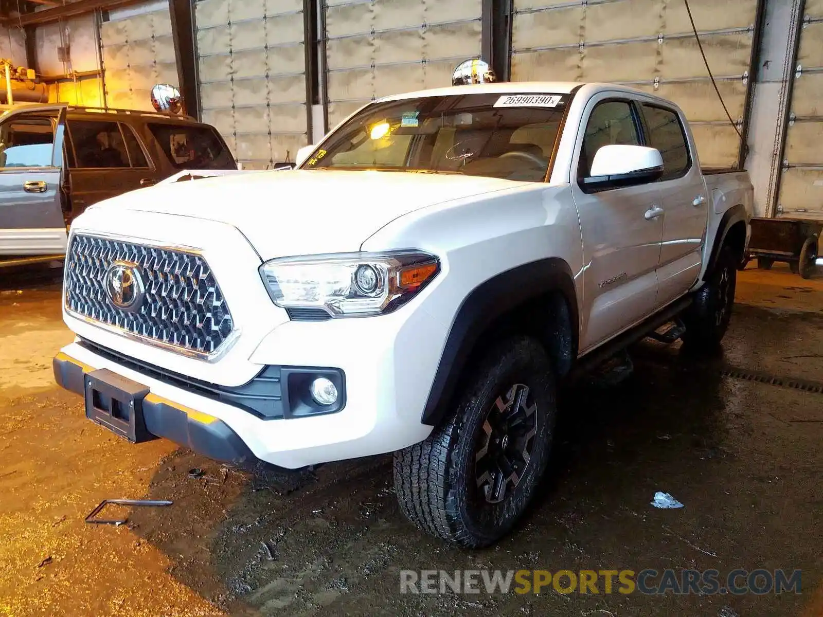 2 Photograph of a damaged car 3TMCZ5AN7KM276458 TOYOTA TACOMA 2019