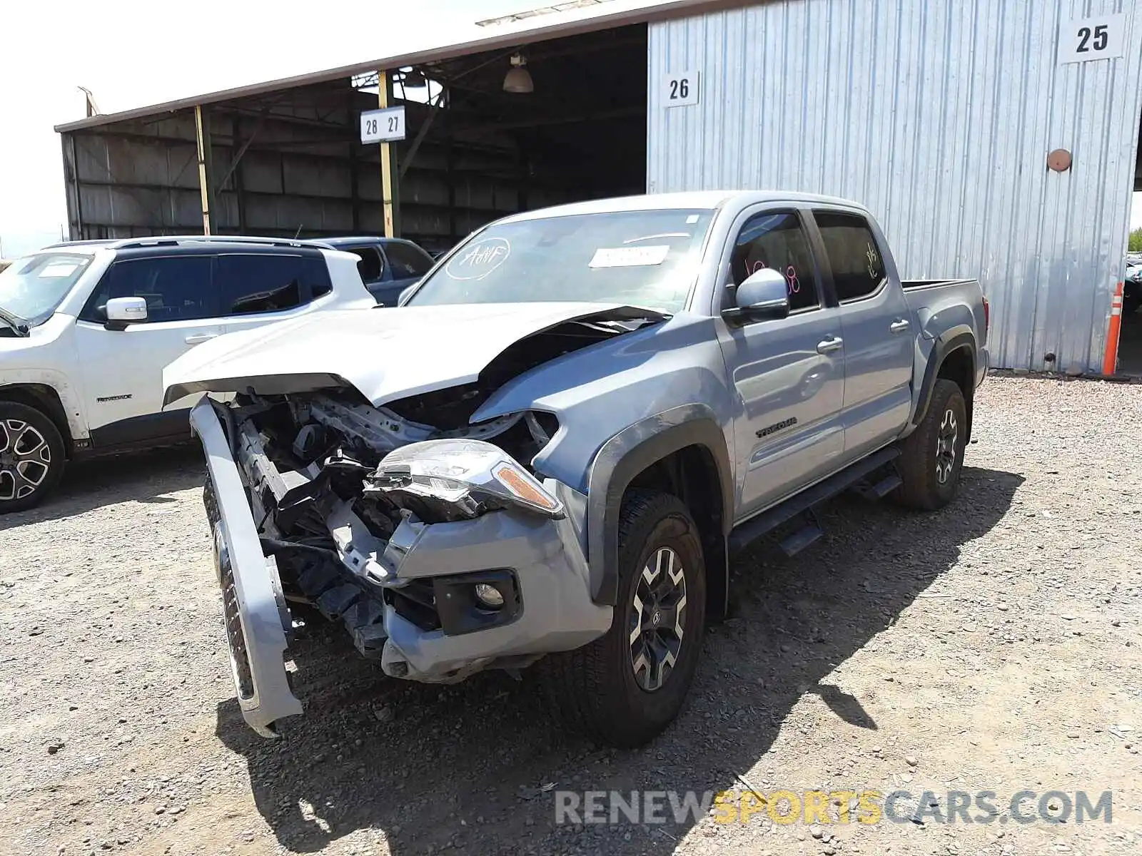 2 Photograph of a damaged car 3TMCZ5AN7KM282552 TOYOTA TACOMA 2019