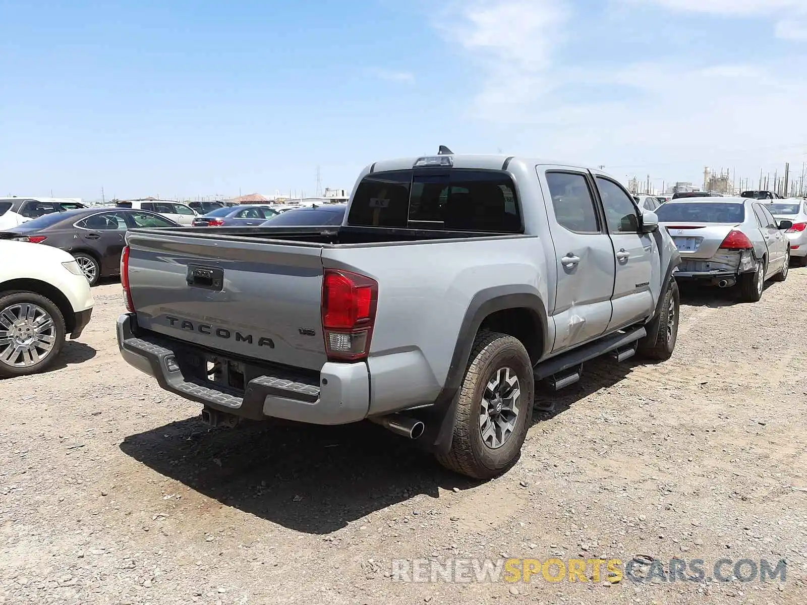 4 Photograph of a damaged car 3TMCZ5AN7KM282552 TOYOTA TACOMA 2019