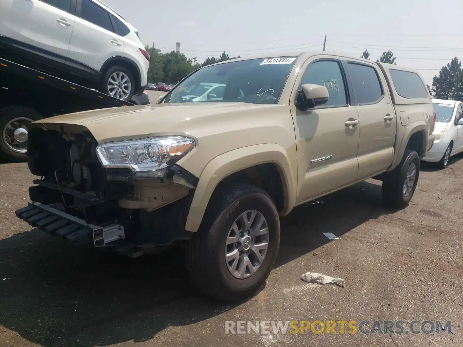 2 Photograph of a damaged car 3TMCZ5AN7KM286245 TOYOTA TACOMA 2019