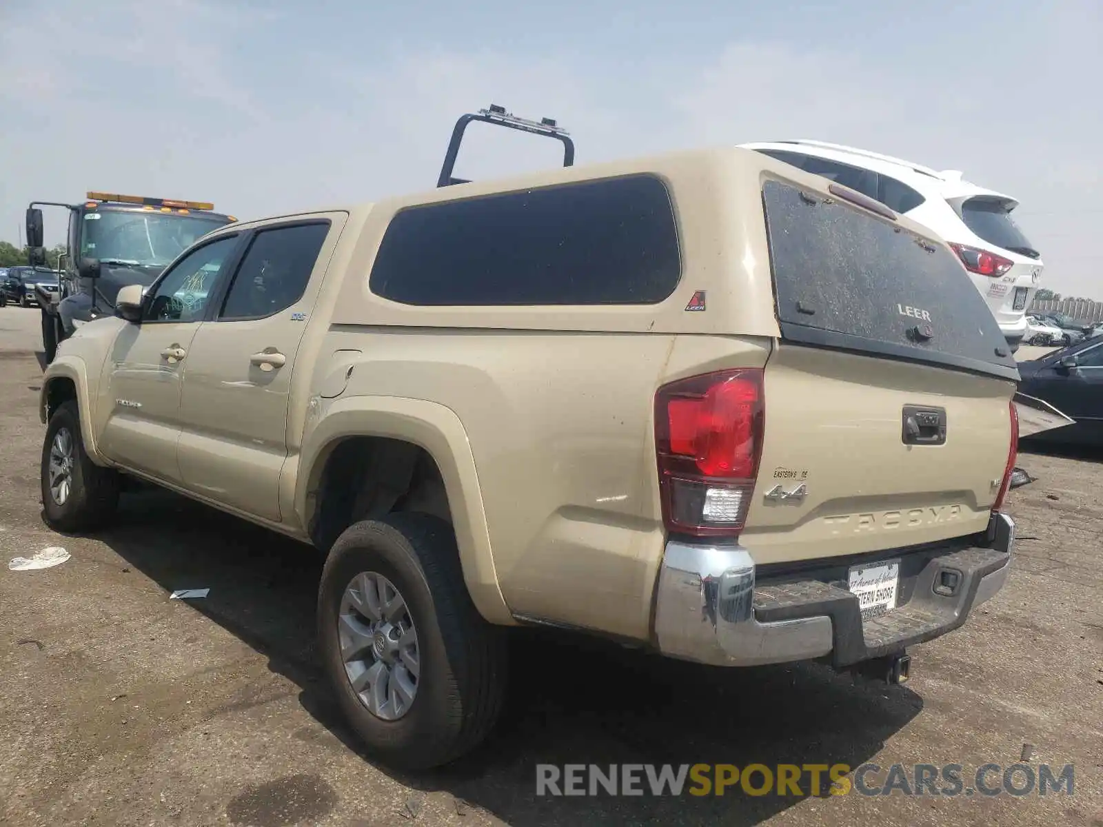 3 Photograph of a damaged car 3TMCZ5AN7KM286245 TOYOTA TACOMA 2019