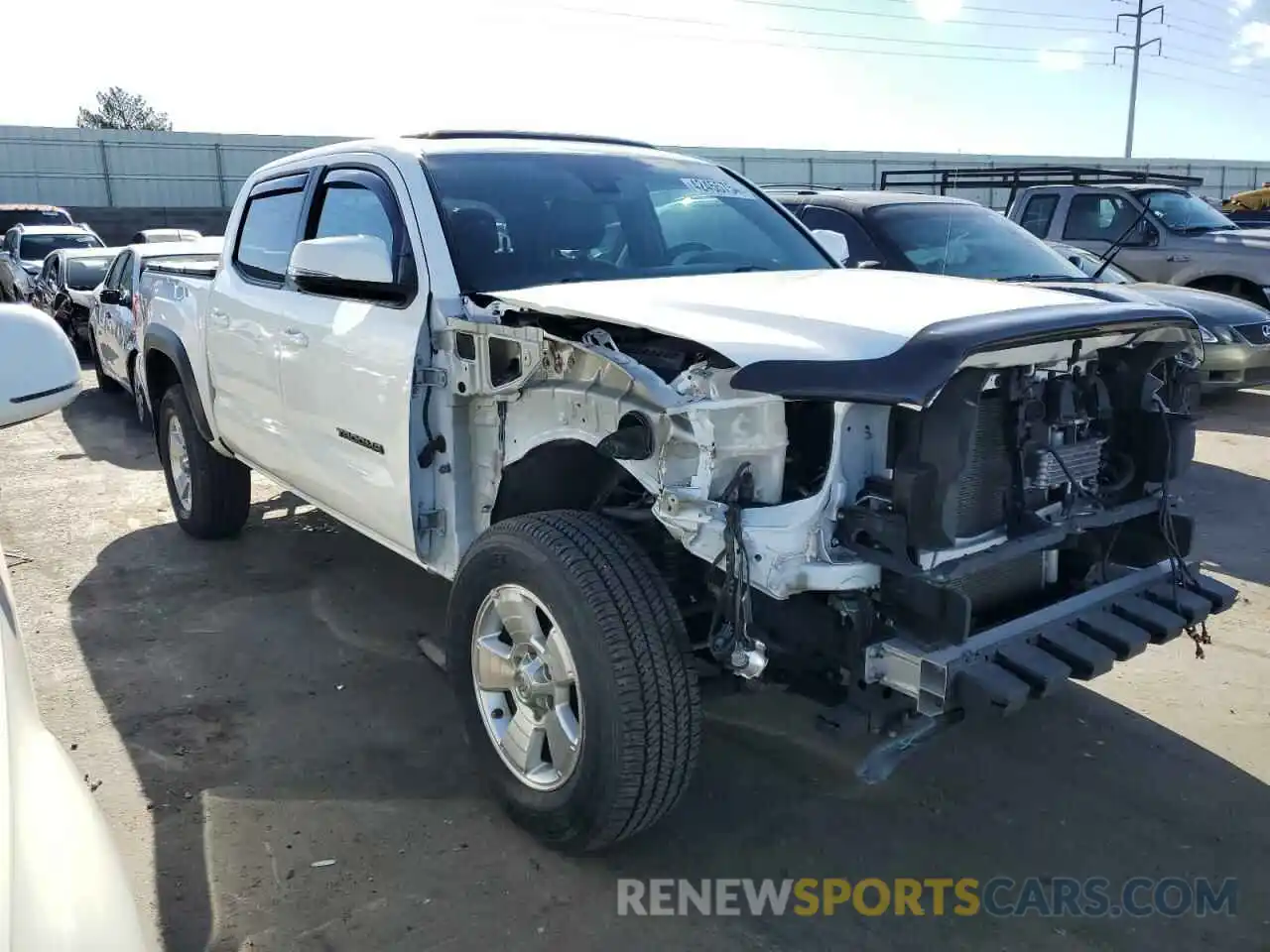 4 Photograph of a damaged car 3TMCZ5AN7KM286598 TOYOTA TACOMA 2019