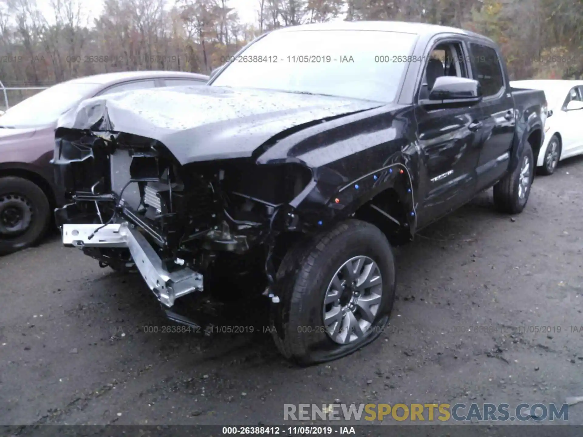 2 Photograph of a damaged car 3TMCZ5AN7KM286651 TOYOTA TACOMA 2019