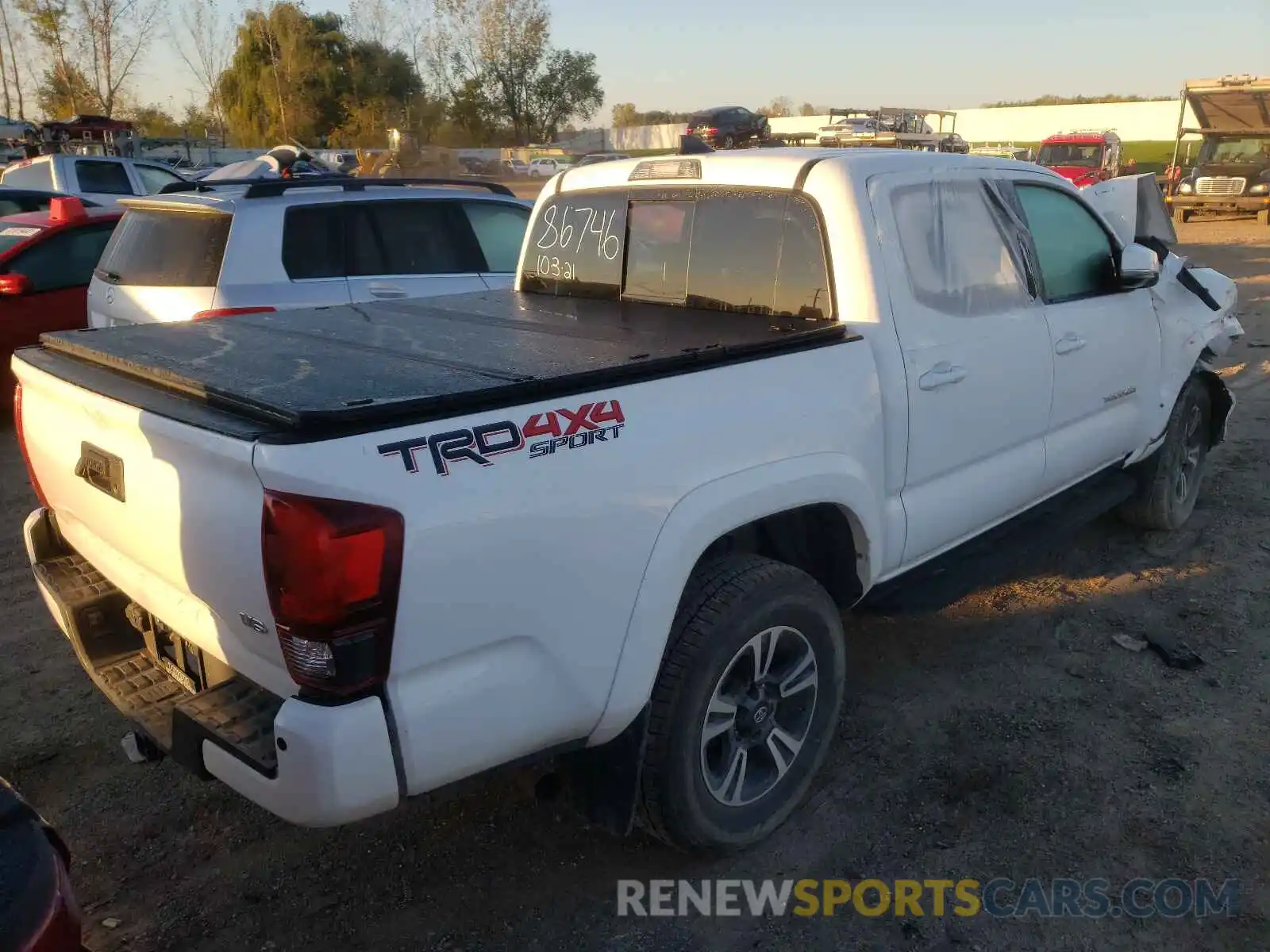 4 Photograph of a damaged car 3TMCZ5AN7KM286746 TOYOTA TACOMA 2019