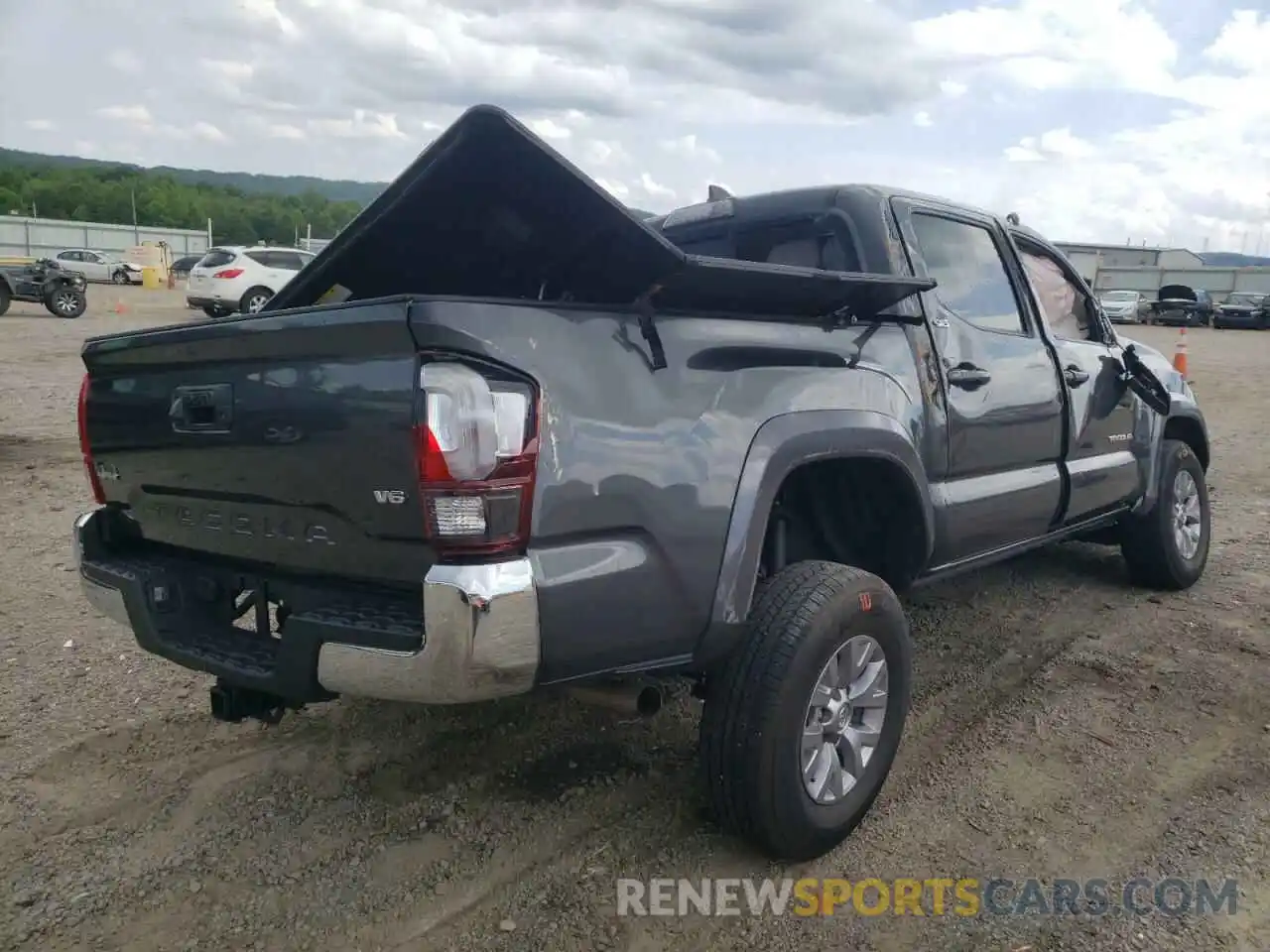 4 Photograph of a damaged car 3TMCZ5AN7KM286925 TOYOTA TACOMA 2019