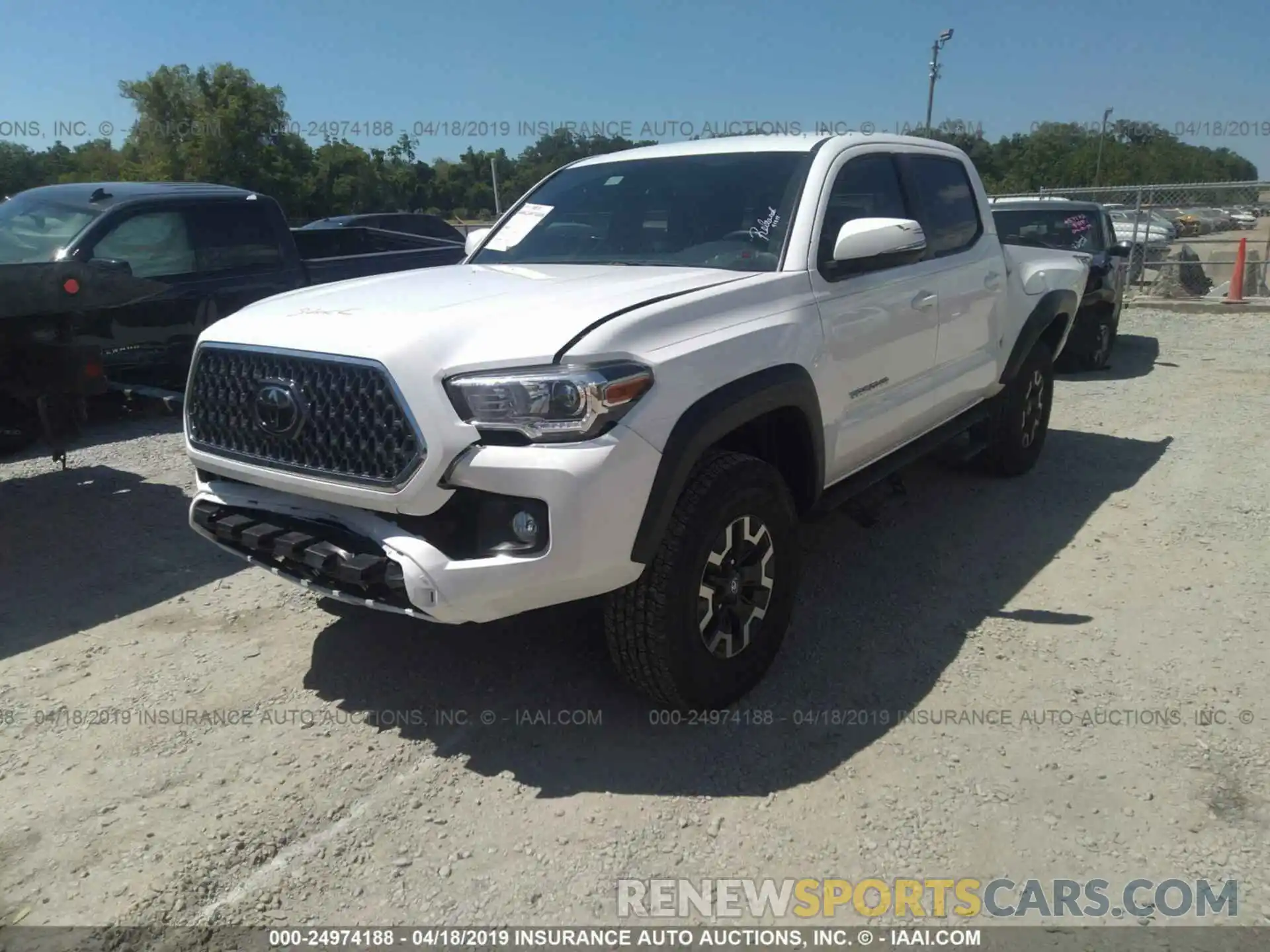 2 Photograph of a damaged car 3TMCZ5AN8KM189877 TOYOTA TACOMA 2019