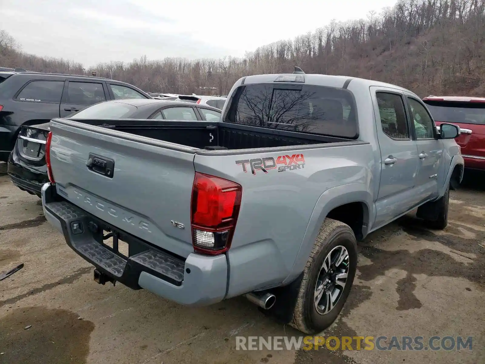 4 Photograph of a damaged car 3TMCZ5AN8KM191712 TOYOTA TACOMA 2019