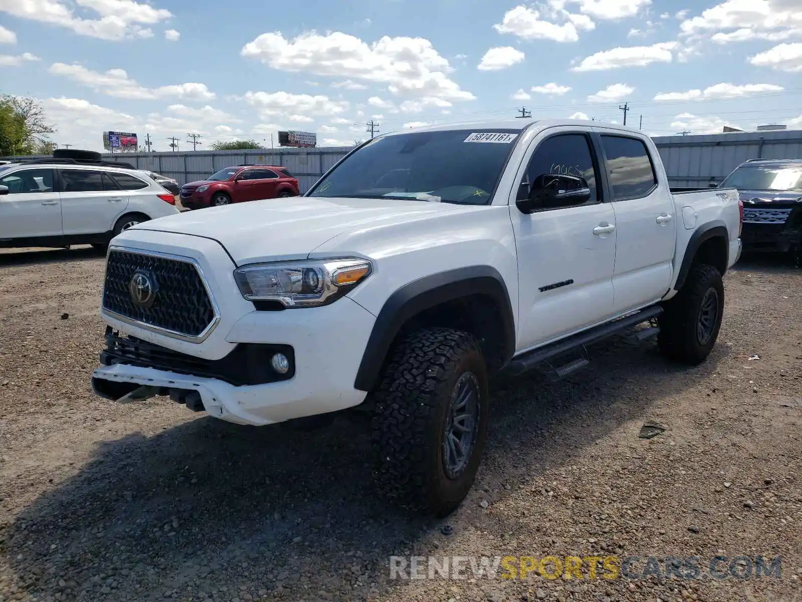 2 Photograph of a damaged car 3TMCZ5AN8KM196411 TOYOTA TACOMA 2019