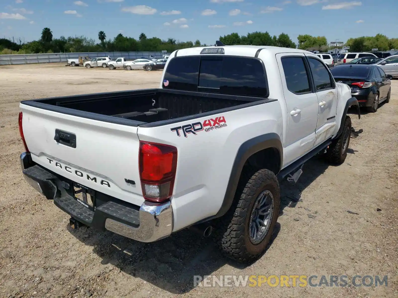 4 Photograph of a damaged car 3TMCZ5AN8KM196411 TOYOTA TACOMA 2019