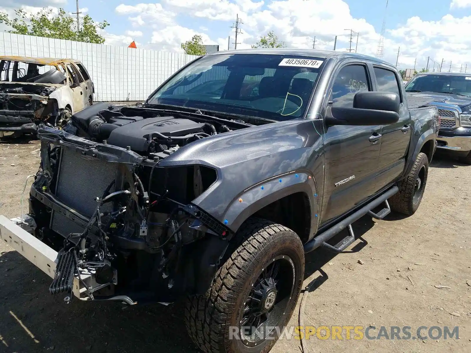 2 Photograph of a damaged car 3TMCZ5AN8KM197235 TOYOTA TACOMA 2019