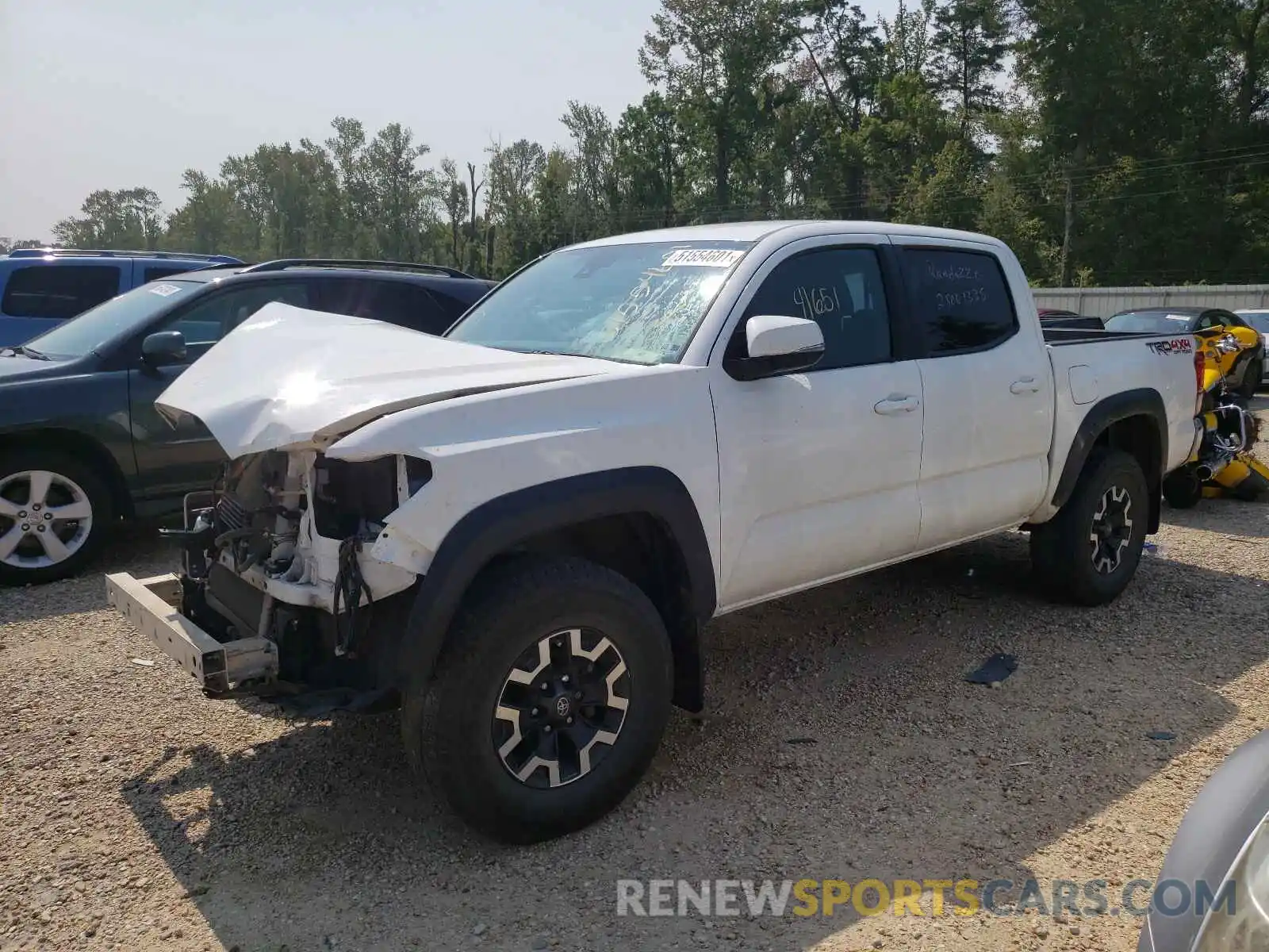 2 Photograph of a damaged car 3TMCZ5AN8KM197865 TOYOTA TACOMA 2019