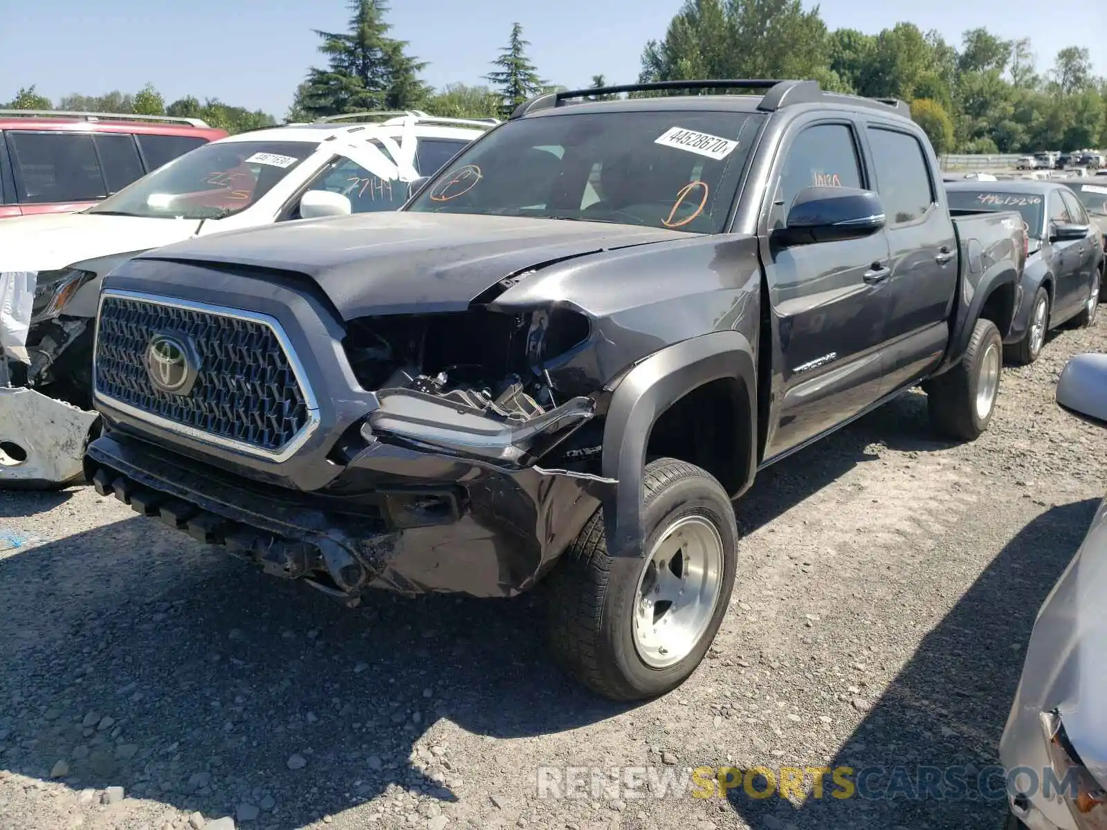 2 Photograph of a damaged car 3TMCZ5AN8KM207049 TOYOTA TACOMA 2019