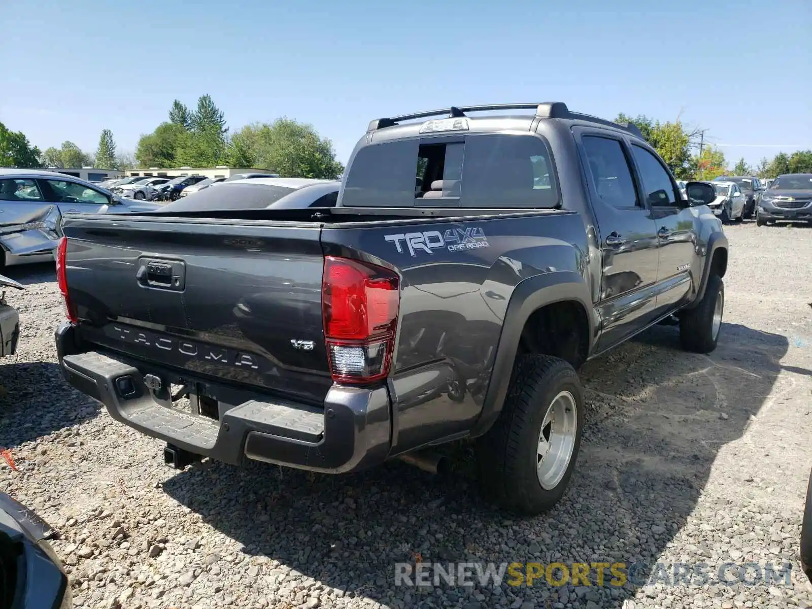 4 Photograph of a damaged car 3TMCZ5AN8KM207049 TOYOTA TACOMA 2019