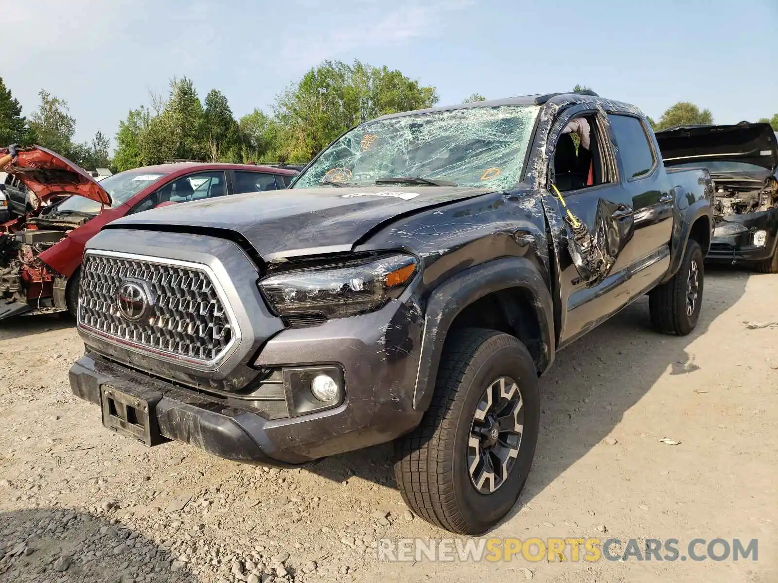 2 Photograph of a damaged car 3TMCZ5AN8KM210811 TOYOTA TACOMA 2019