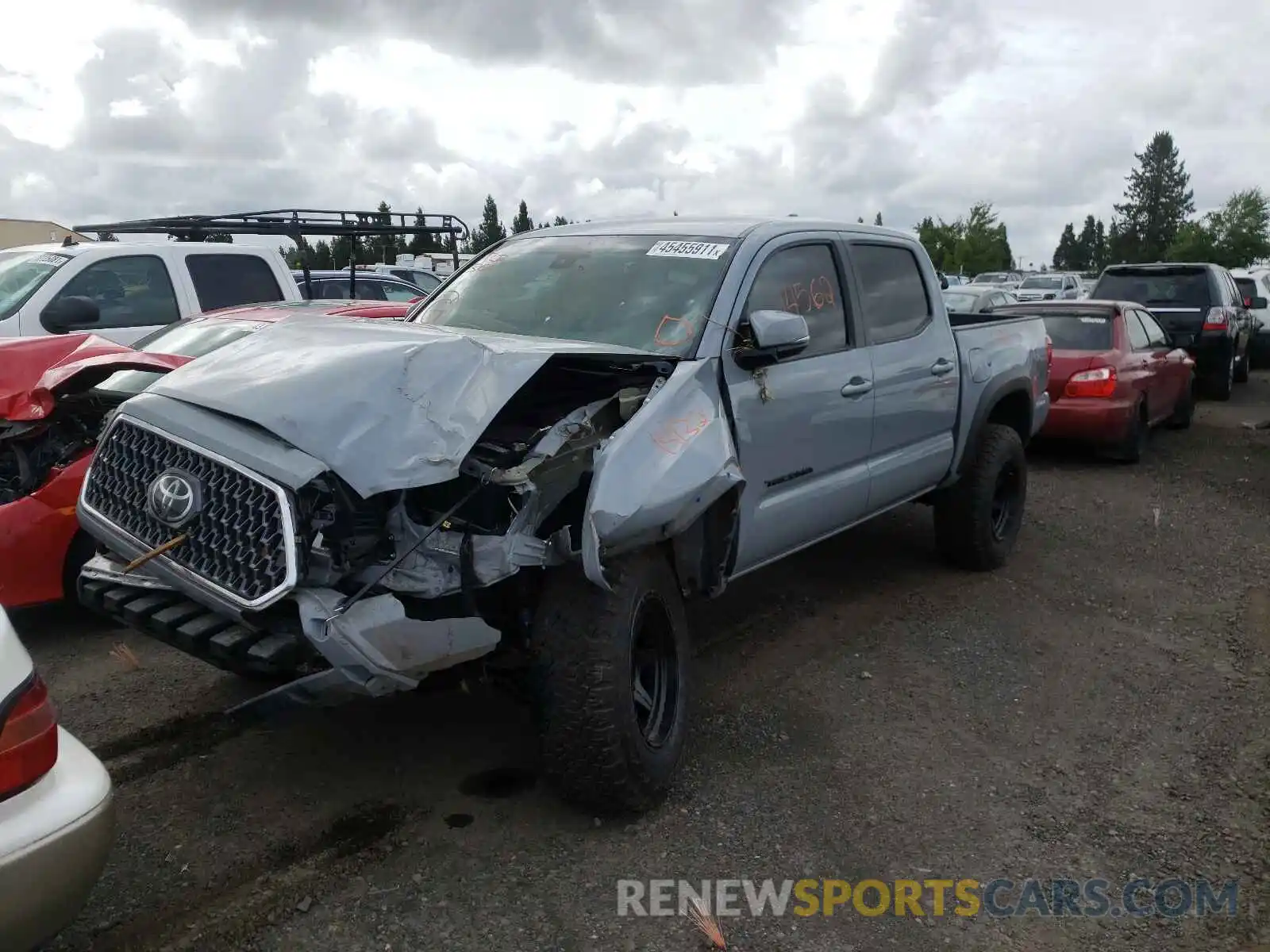 2 Photograph of a damaged car 3TMCZ5AN8KM212168 TOYOTA TACOMA 2019