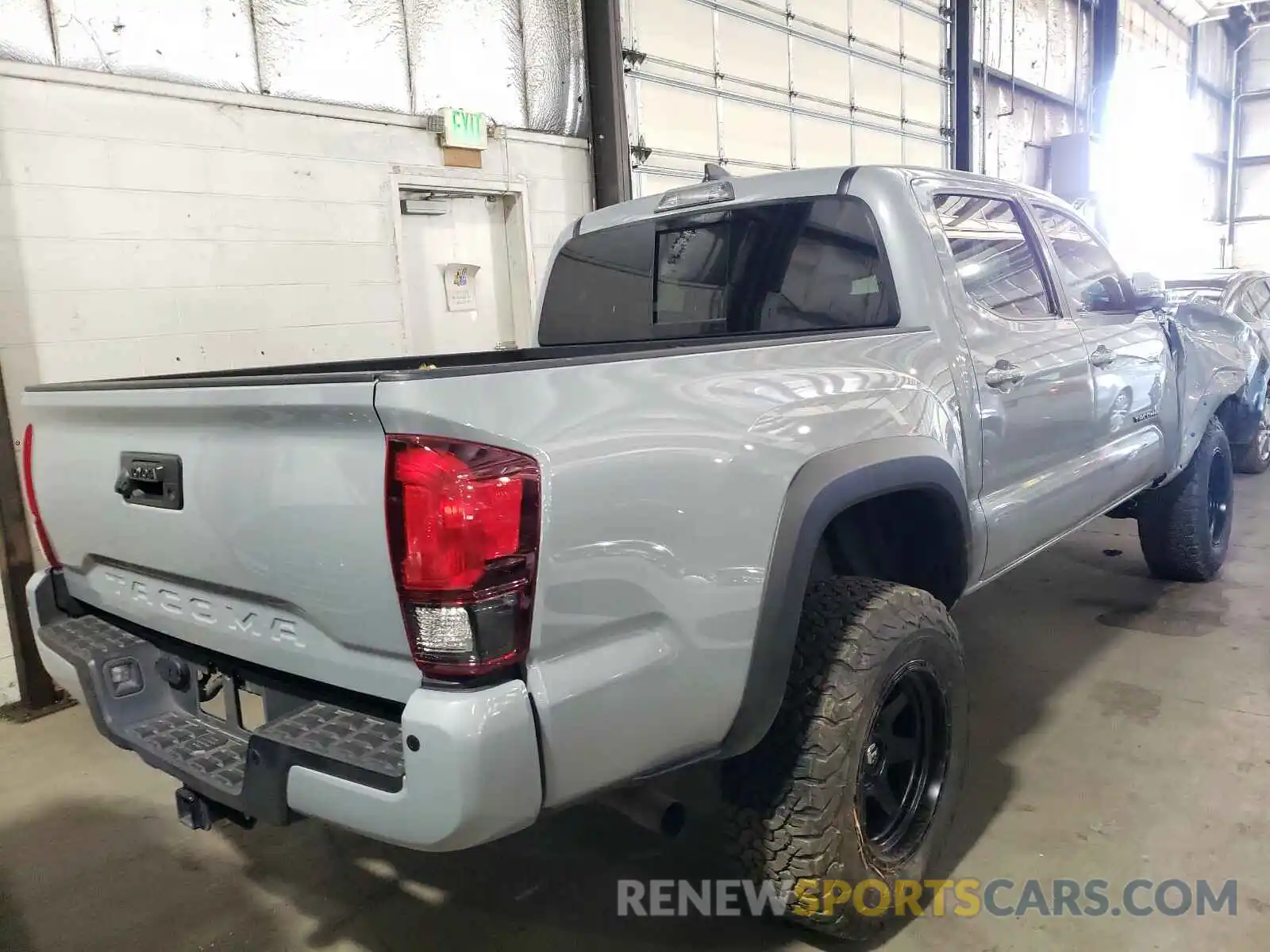 4 Photograph of a damaged car 3TMCZ5AN8KM212168 TOYOTA TACOMA 2019